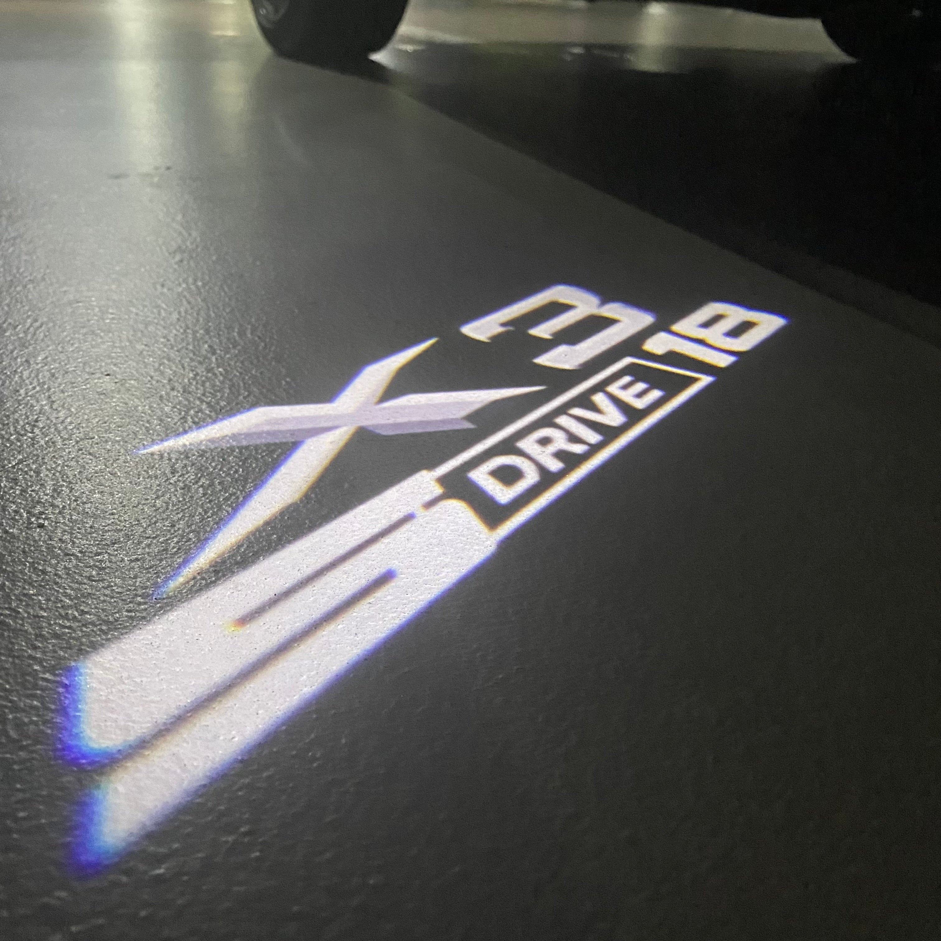 BMW X3 S Drive 18 LOGO PROJECTOT LIGHTS (quantity 1 = 1 sets/2 door lights)Nr.bmw0052