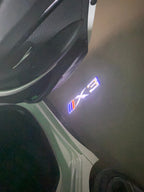 BMW X3  LOGO PROJECTOT LIGHTS (quantity 1 = 1 sets/2 door lights)Nr.bmw0050