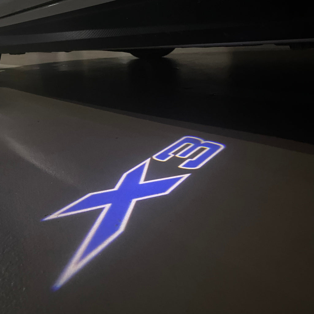 BMW  X3   LOGO PROJECTOT LIGHTS (quantity 1 = 1 sets/2 door lights)Nr.bmw0061