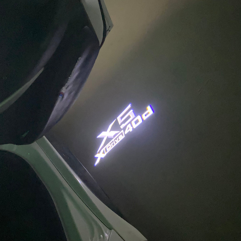 BMW  X5  X Drive 40d  LOGO PROJECTOT LIGHTS (quantity 1 = 1 sets/2 door lights)Nr.bmw0097