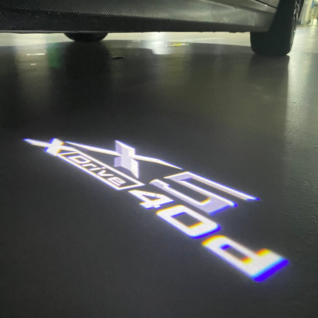 BMW  X5  X Drive 40d  LOGO PROJECTOT LIGHTS (quantity 1 = 1 sets/2 door lights)Nr.bmw0097
