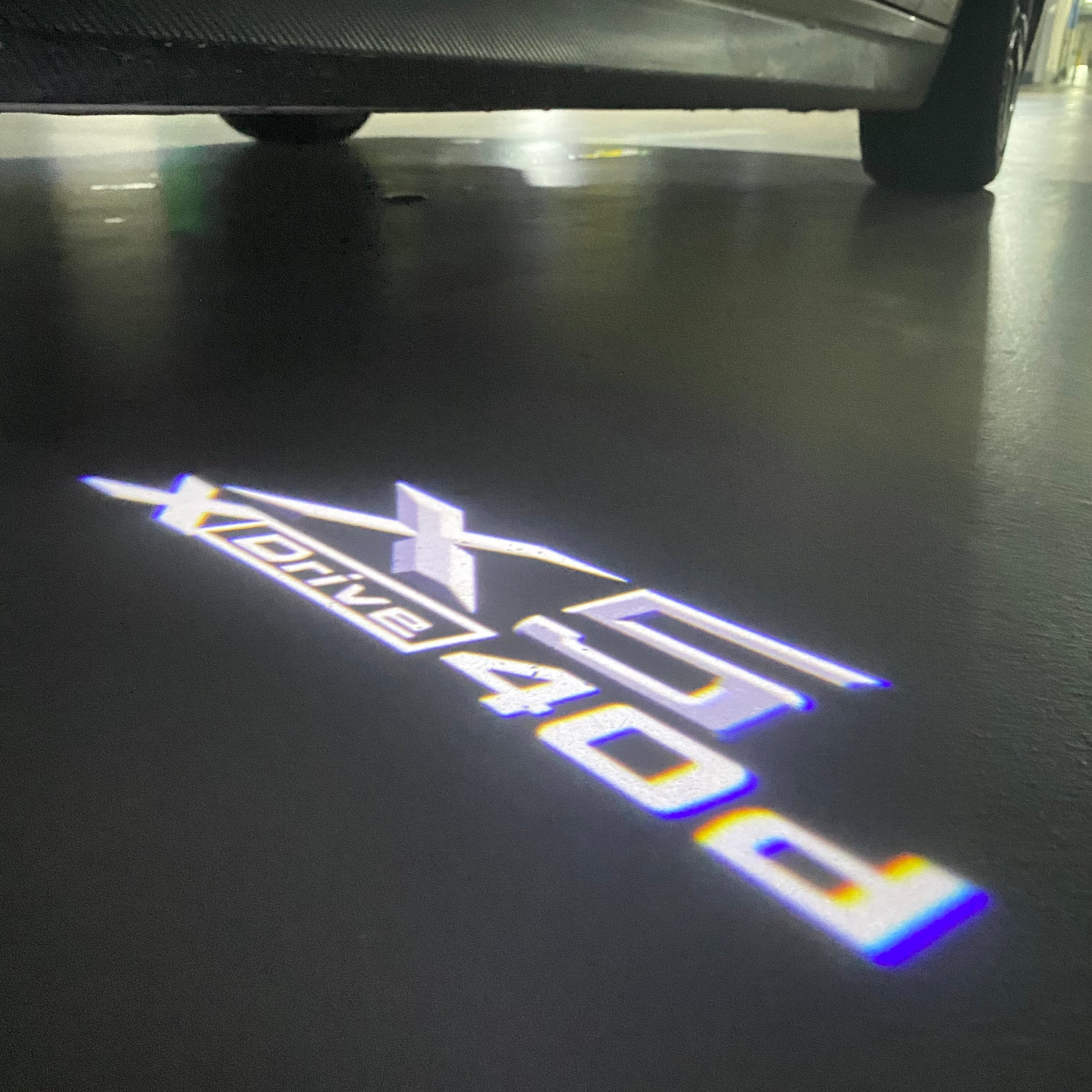 BMW  X5  X Drive 40d  LOGO PROJECTOT LIGHTS (quantity 1 = 1 sets/2 door lights)Nr.bmw0097