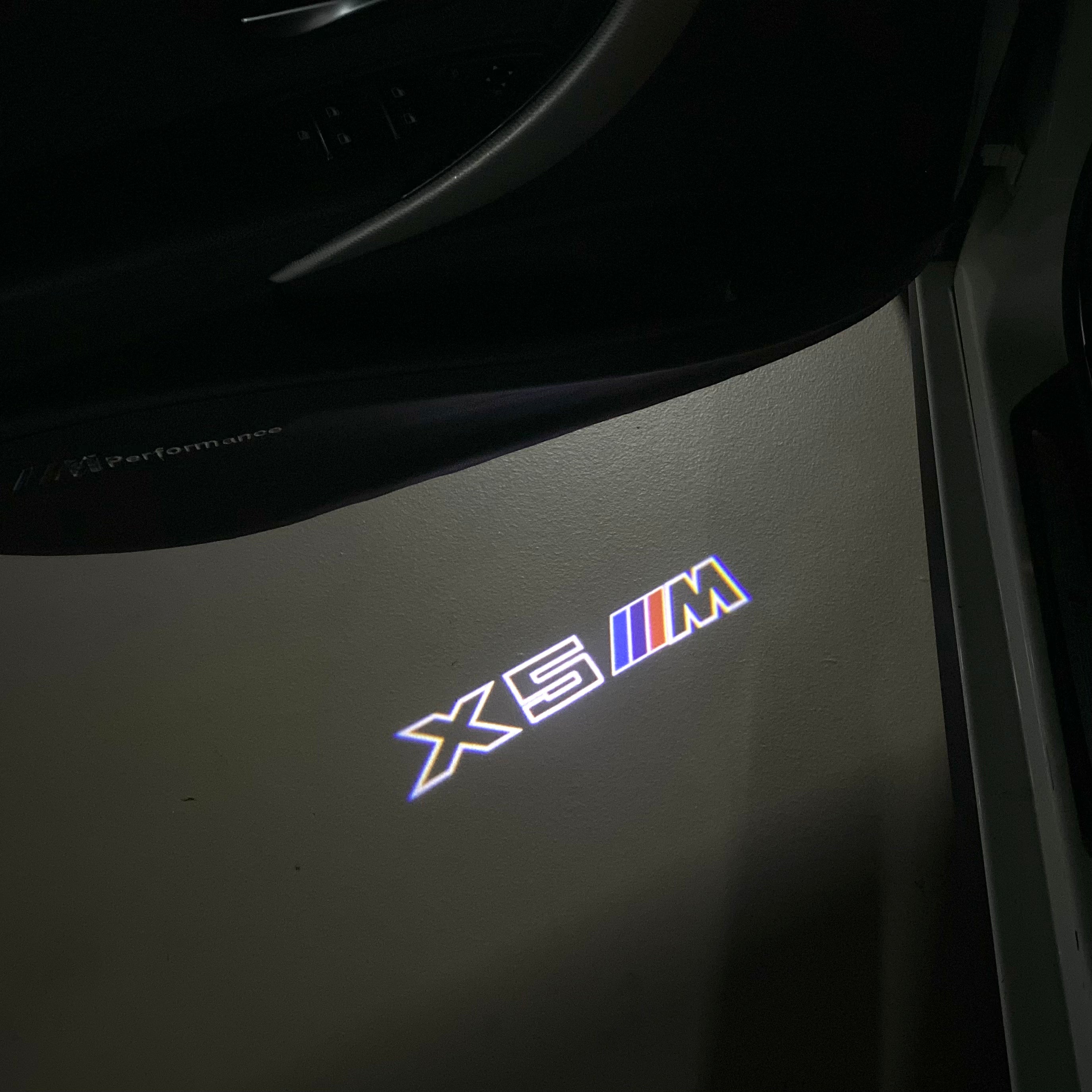 BMW X5M LOGO PROJECTOT LIGHTS (quantity 1 = 1 sets/2 door lights)Nr.bmw00108