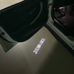BMW X5M LOGO PROJECTOT LIGHTS (quantity 1 = 1 sets/2 door lights)Nr.bmw00108
