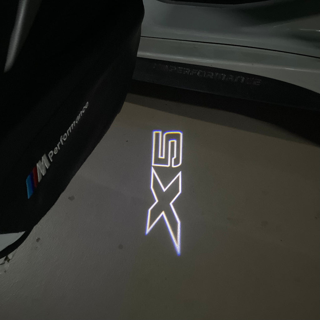 BMW X5    LOGO PROJECTOT LIGHTS (quantity 1 = 1 sets/2 door lights)Nr.bmw00112