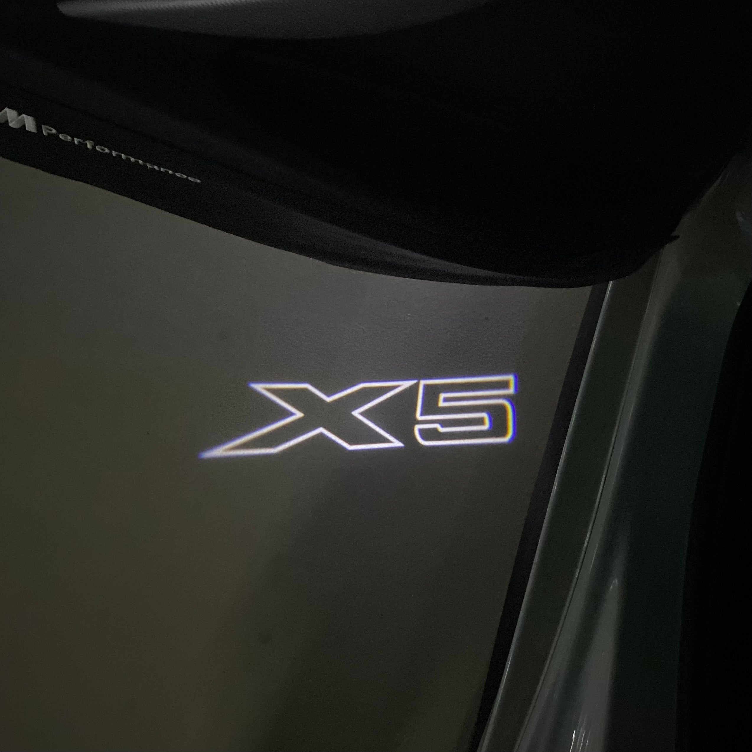 BMW X5    LOGO PROJECTOT LIGHTS (quantity 1 = 1 sets/2 door lights)Nr.bmw00112