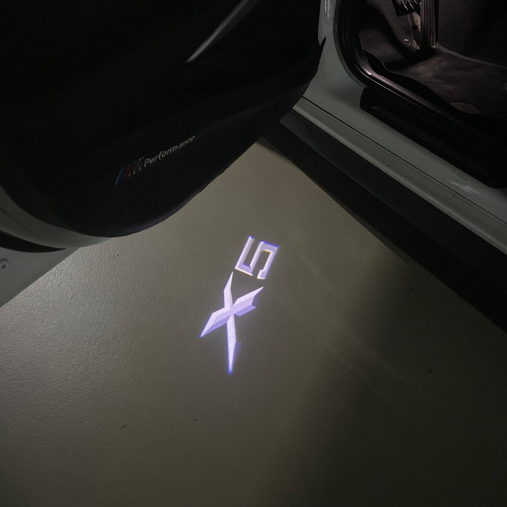 BMW X5    LOGO PROJECTOT LIGHTS (quantity 1 = 1 sets/2 door lights)Nr.bmw0096