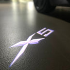 BMW X5    LOGO PROJECTOT LIGHTS (quantity 1 = 1 sets/2 door lights)Nr.bmw0096