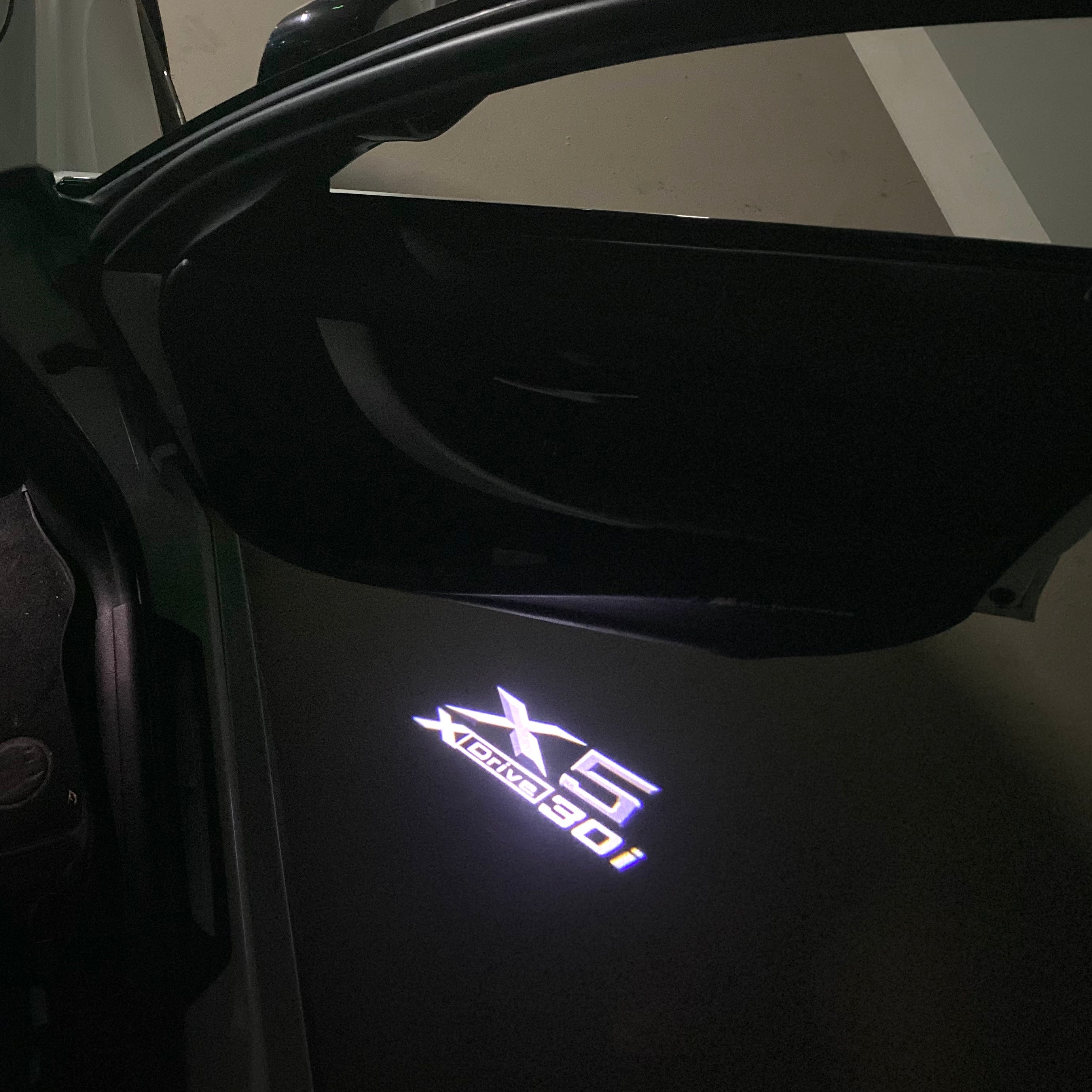 BMW X5 X Drive 30i  LOGO PROJECTOT LIGHTS (quantity 1 = 1 sets/2 door lights)Nr.bmw00119