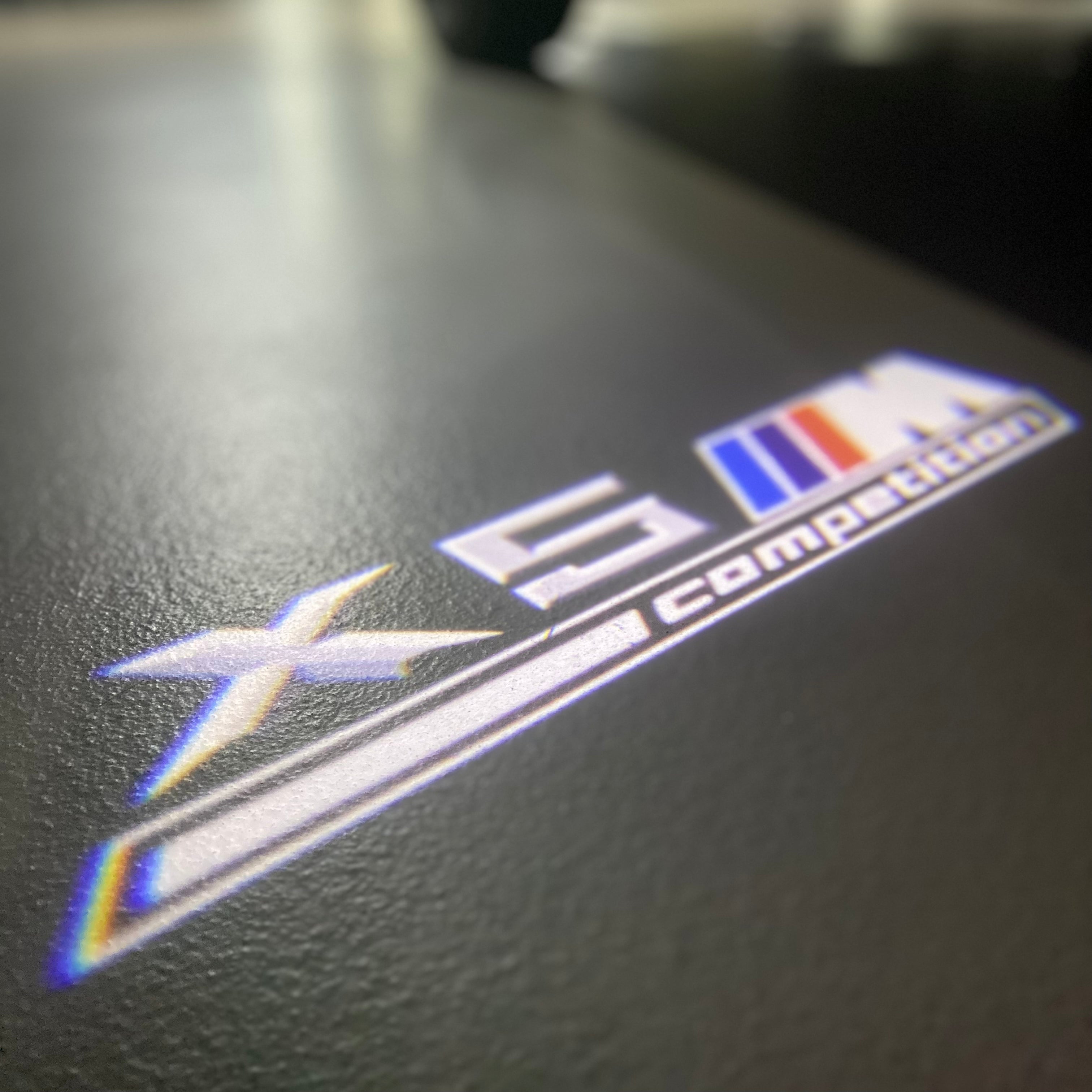 BMW X5M  LOGO PROJECTOT LIGHTS (quantity 1 = 1 sets/2 door lights)Nr.bmw0029