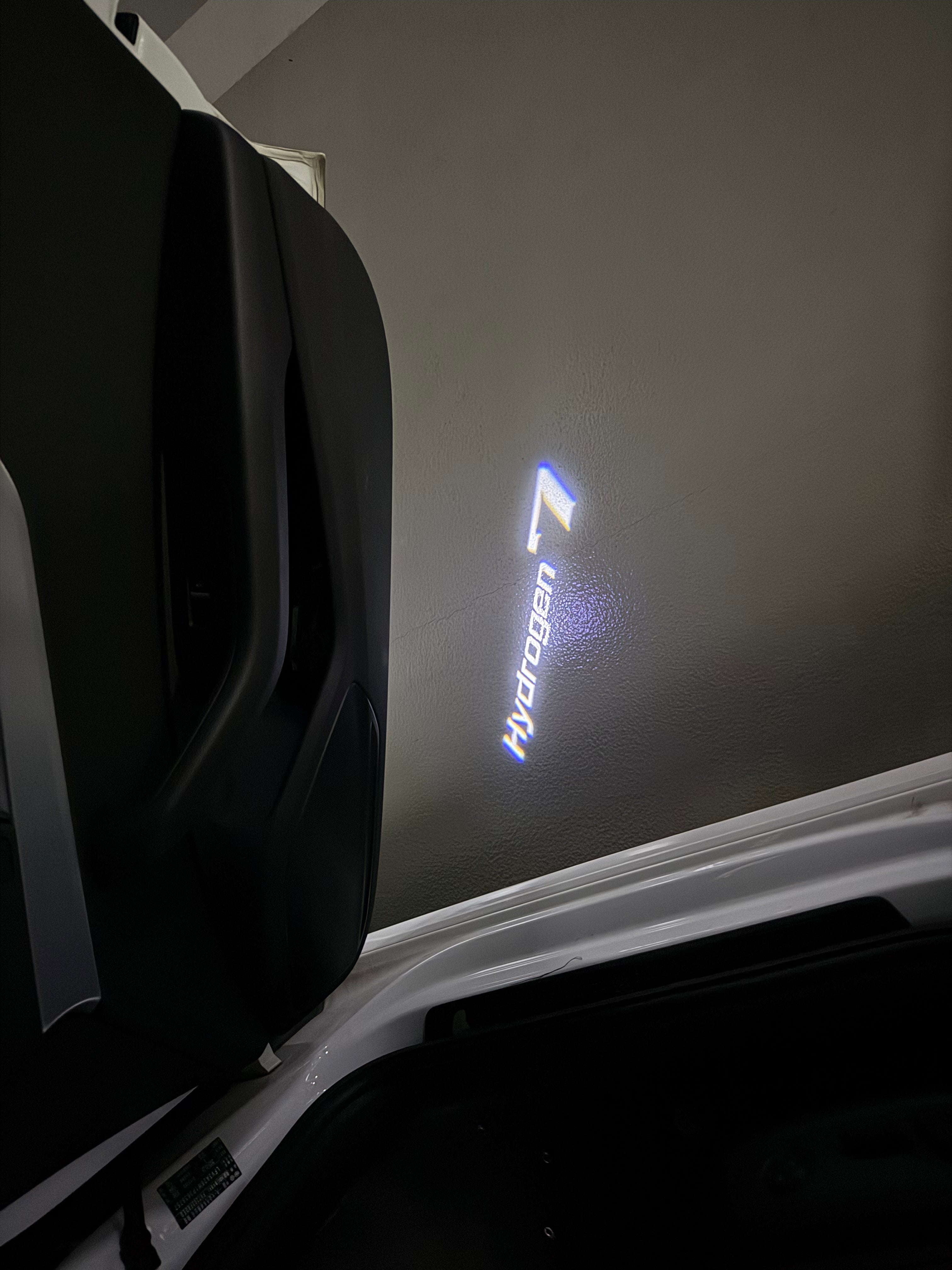 BMW HYDROGEN 7  LOGO PROJECTOT LIGHTS (quantity 1 = 1 sets/2 door lights)Nr.bmw00102