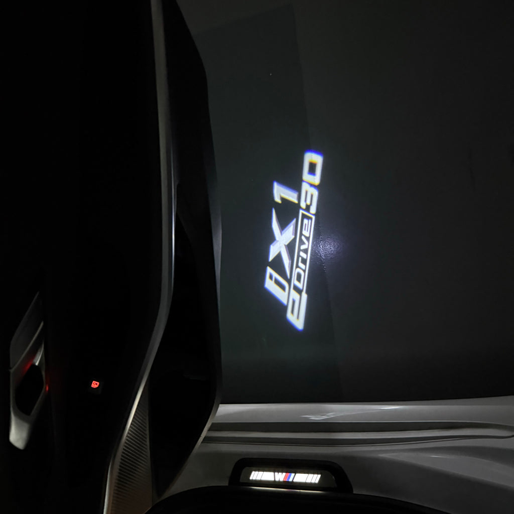 BMW  iX1  LOGO PROJECTOT LIGHTS Nr.600x100
