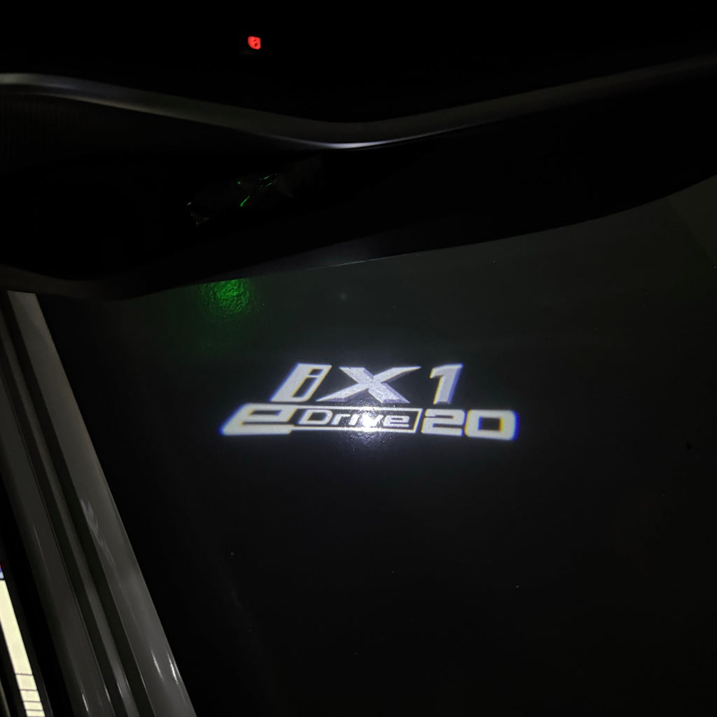 BMW iX1 E Drive  LOGO PROJECTOT LIGHTS (quantity 1 = 1 sets/2 door lights)Nr.bmw00351