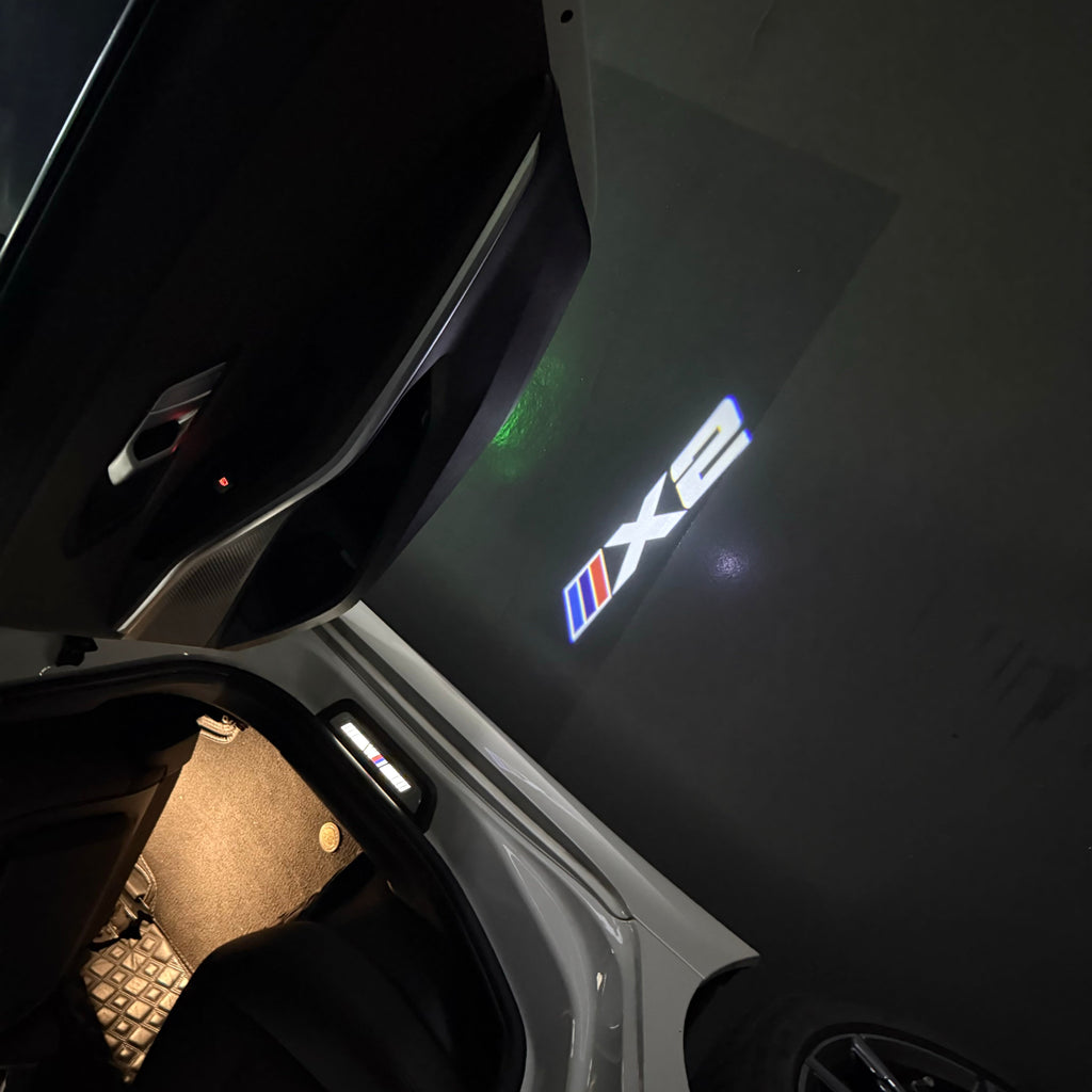 BMW X2    LOGO PROJECTOT LIGHTS (quantity 1 = 1 sets/2 door lights) Nr.bmw0019