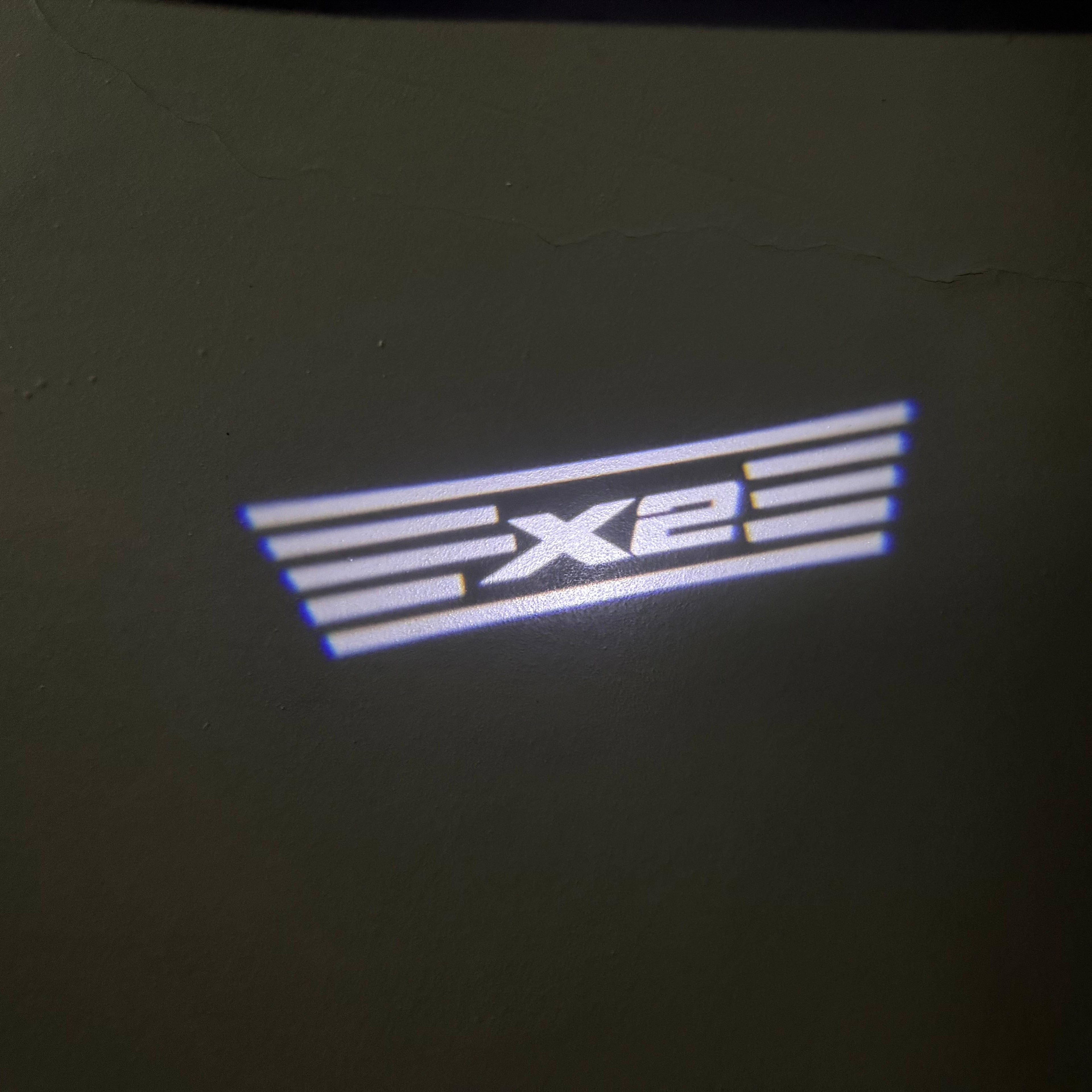 BMW X2  LOGO PROJECTOT LIGHTS (quantity 1 = 1 sets/2 door lights)Nr.bmw0065