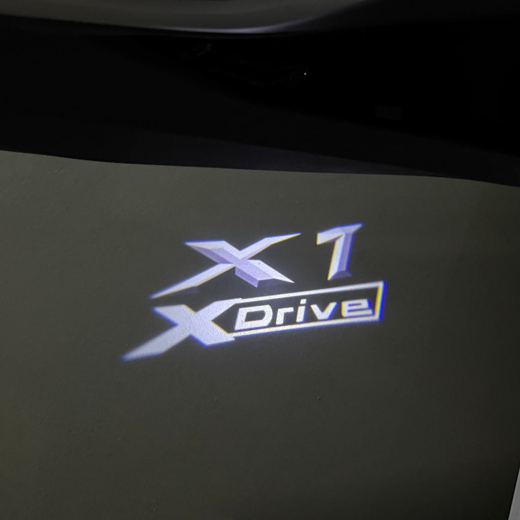 BMW X1 X Drive  LOGO PROJECTOT LIGHTS (quantity 1 = 1 sets/2 door lights)Nr.bmw0023