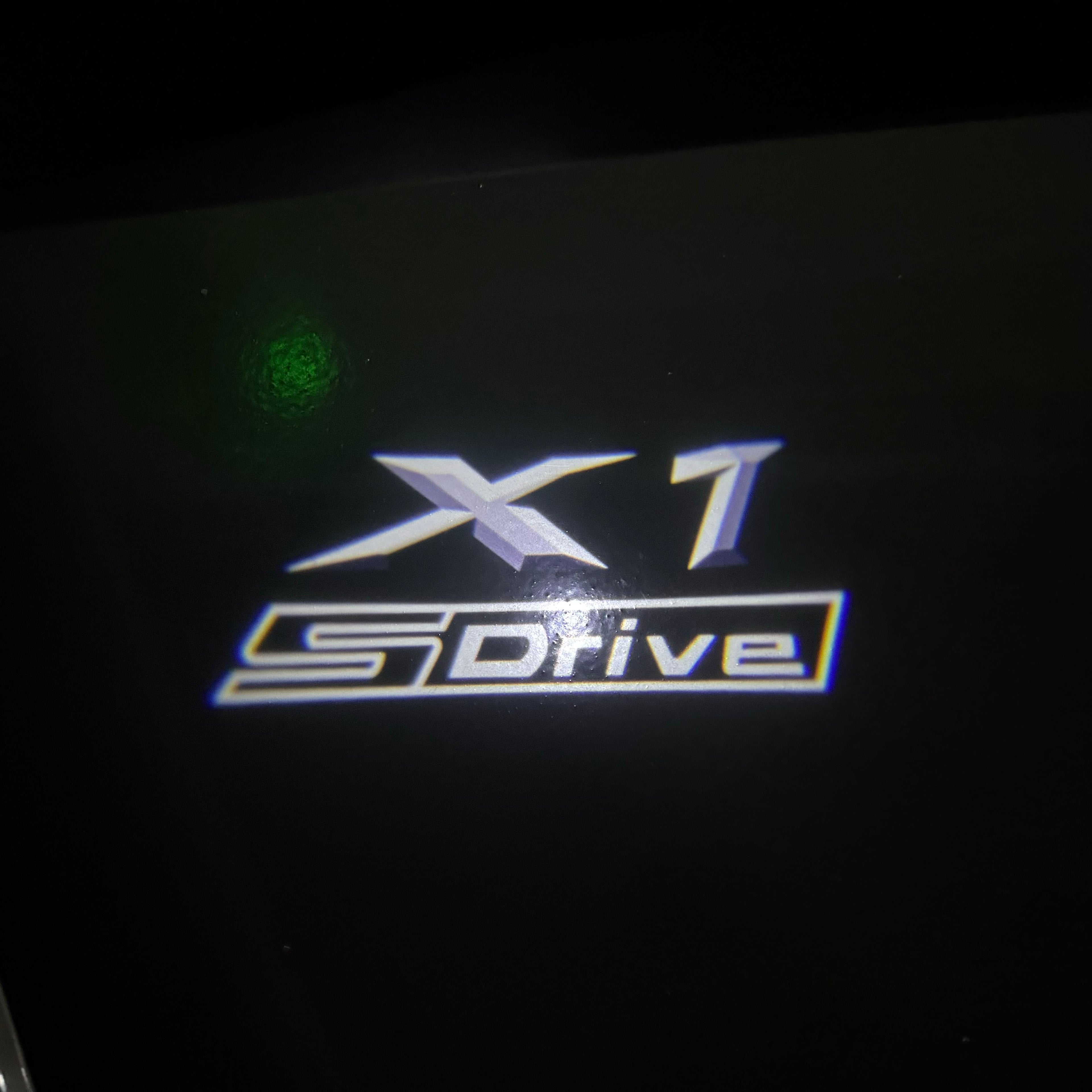 BMW X1 S Drive   LOGO PROJECTOT LIGHTS (quantity 1 = 1 sets/2 door lights) Nr.bmw005