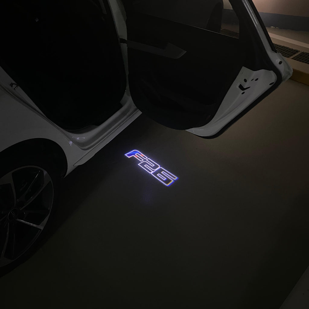 BMW X4 / X4M F26  LOGO PROJECTOT LIGHTS (quantity 1 = 1 sets/2 door lights) Nr.BMW419