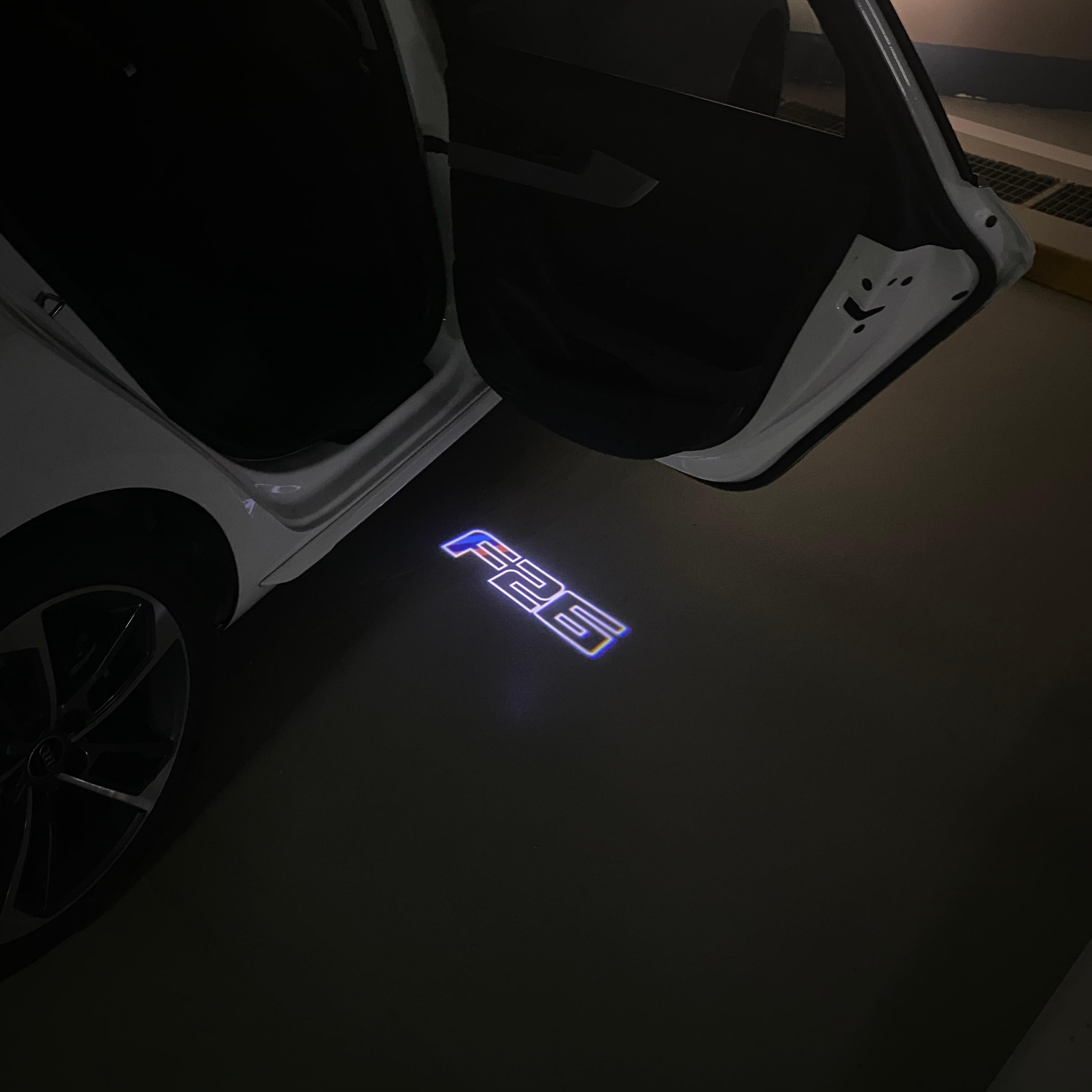 BMW X4 / X4M F26  LOGO PROJECTOT LIGHTS (quantity 1 = 1 sets/2 door lights) Nr.BMW419