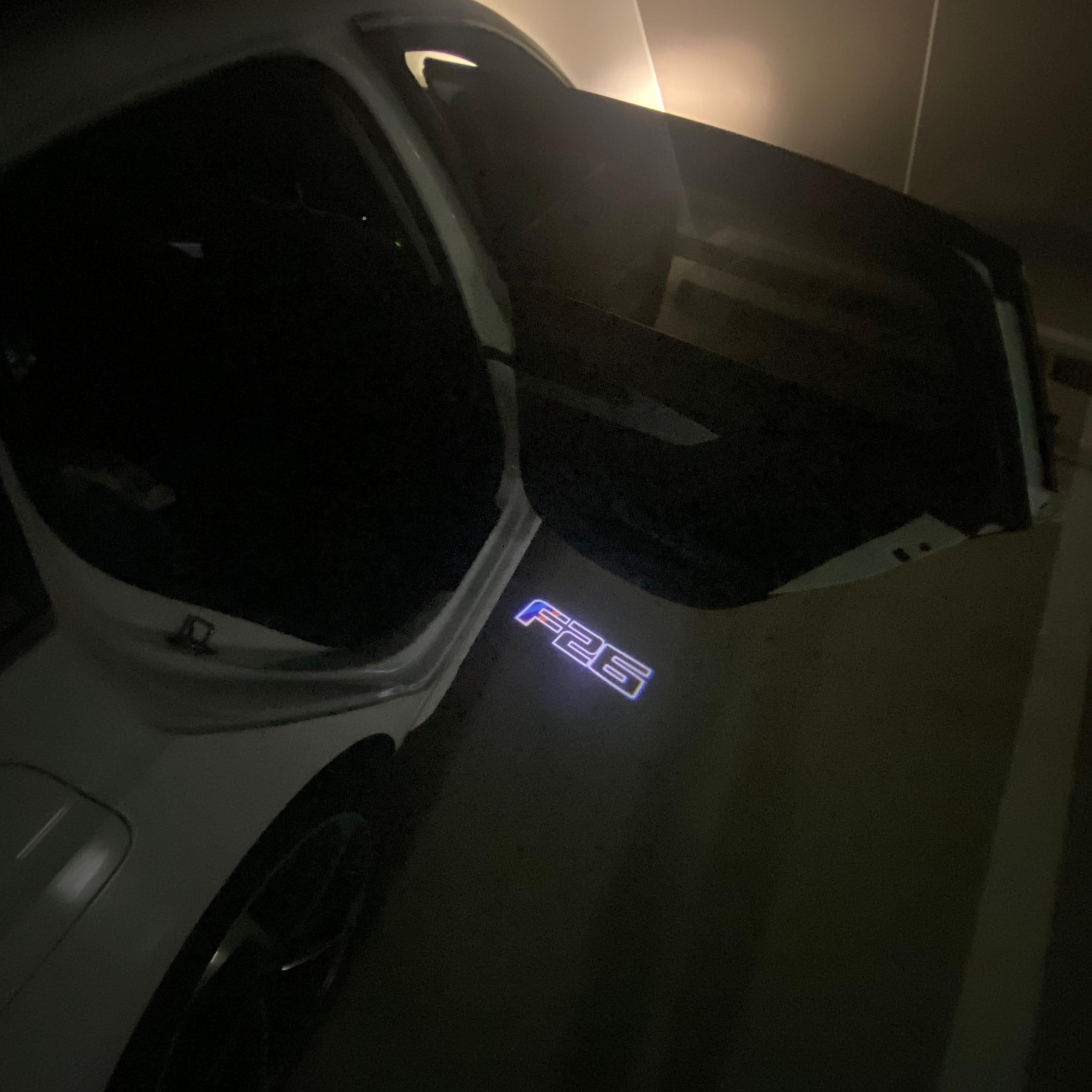 BMW X4 / X4M F26  LOGO PROJECTOT LIGHTS (quantity 1 = 1 sets/2 door lights) Nr.BMW419