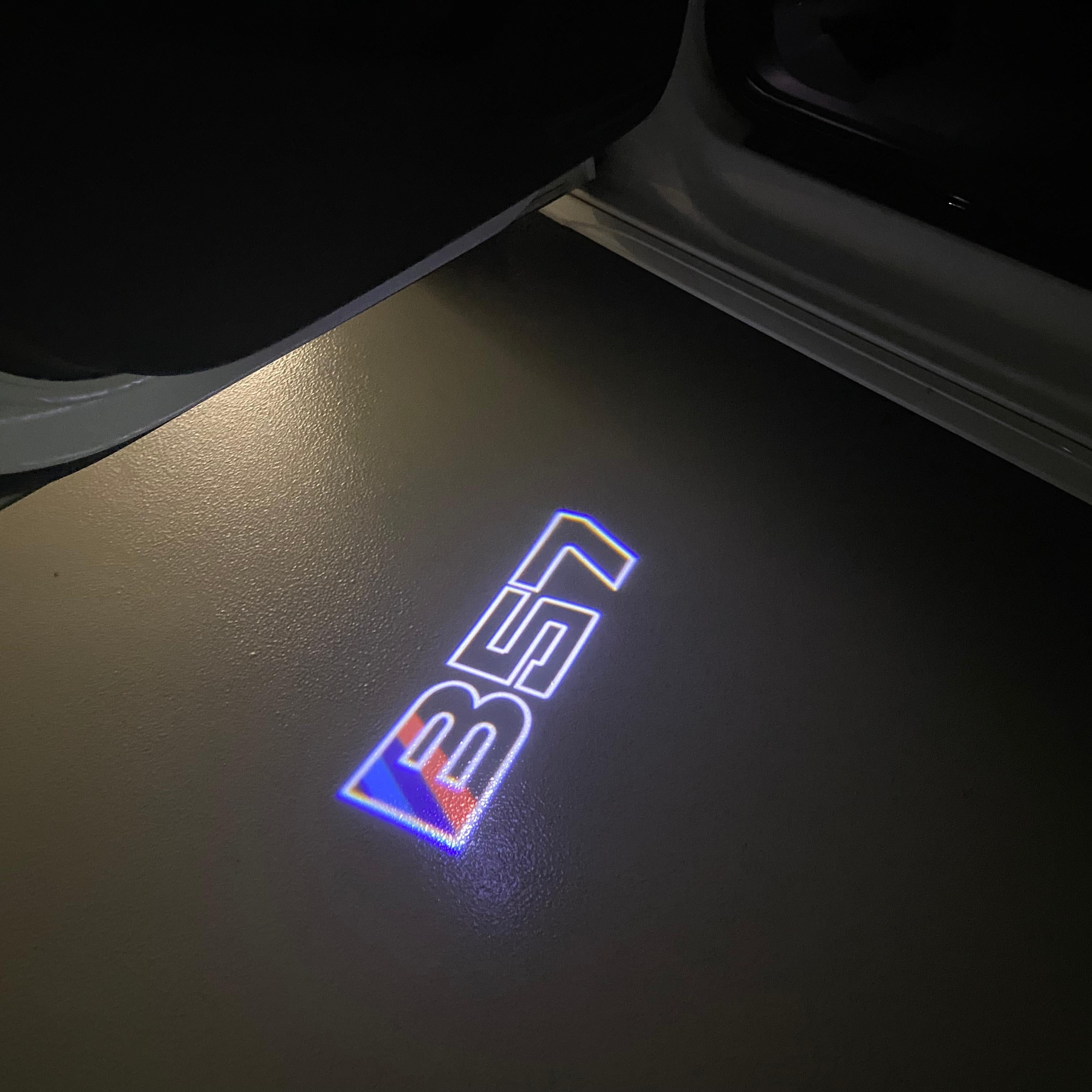 BMW  B57 LOGO PROJECTOT LIGHTS (quantity 1 = 1 sets/2 door lights)Nr.bmw0080