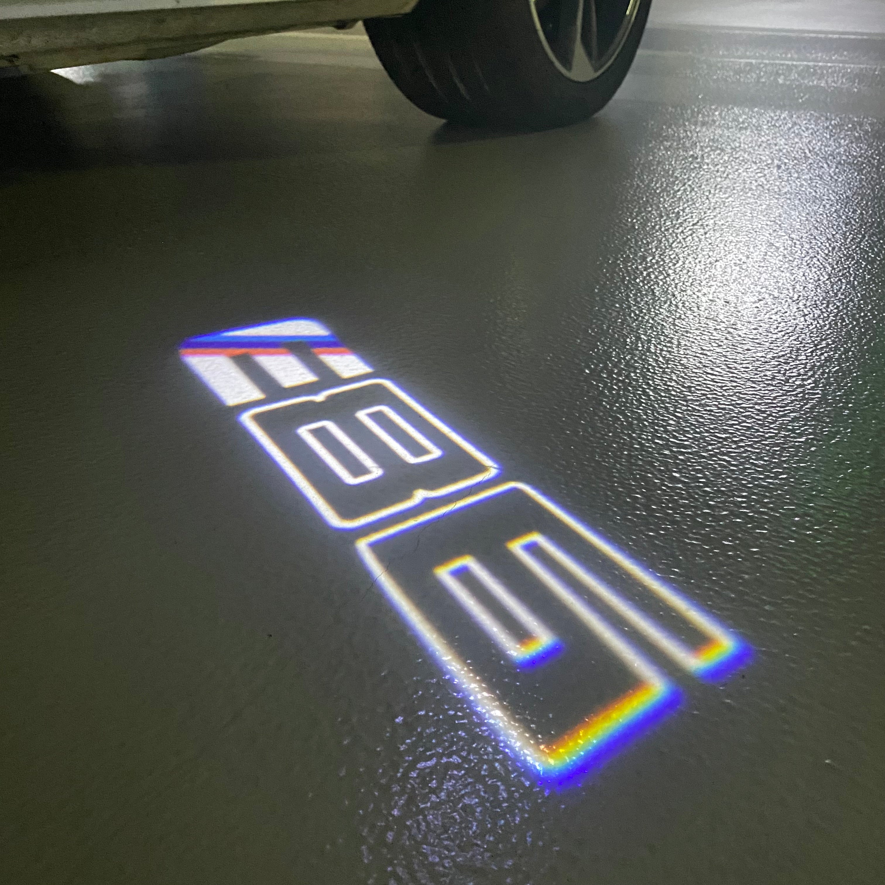 BMW X6 / X6M  E86  LOGO PROJECTOT LIGHTS (quantity 1 = 1 sets/2 door lights)Nr.bmw00138