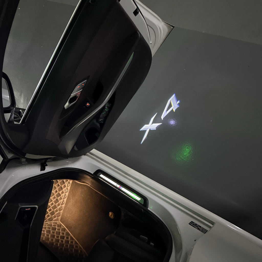 BMW X4    LOGO PROJECTOT LIGHTS (quantity 1 = 1 sets/2 door lights)Nr.bmw0047