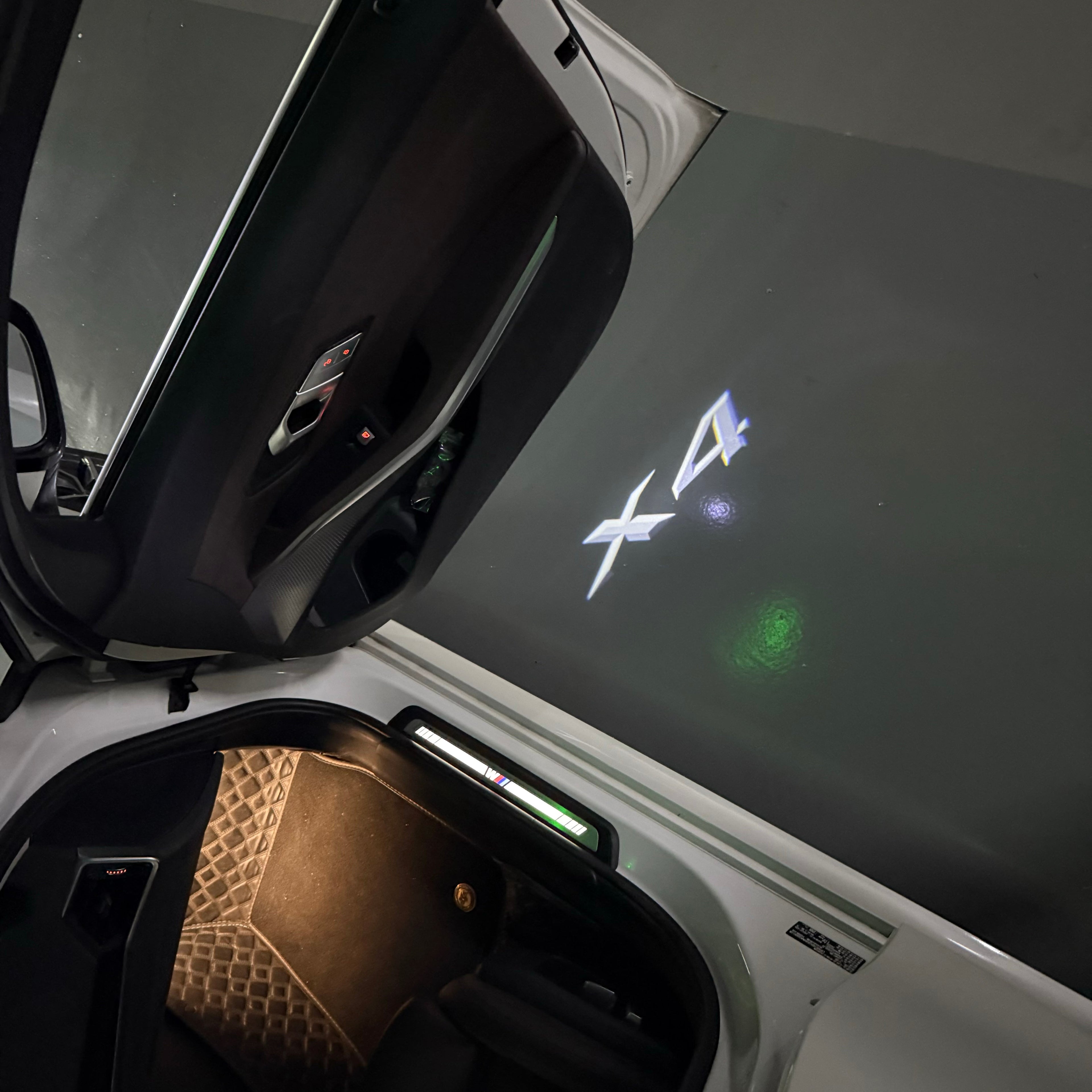 BMW X4    LOGO PROJECTOT LIGHTS (quantity 1 = 1 sets/2 door lights)Nr.bmw0047