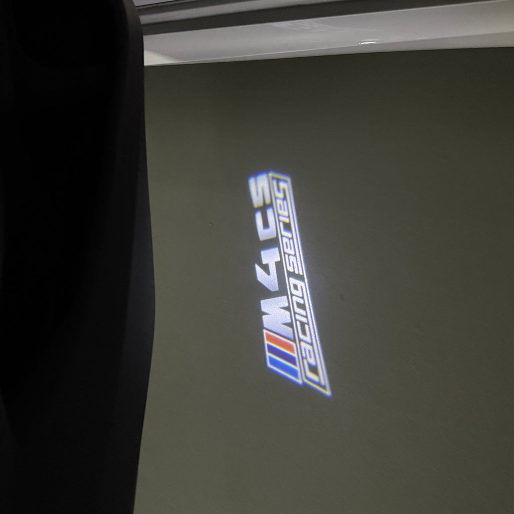BMW 4 SERIES M4  LOGO PROJECTOT LIGHTS (quantity 1 = 1 sets/2 door lights)Nr.bmw00183