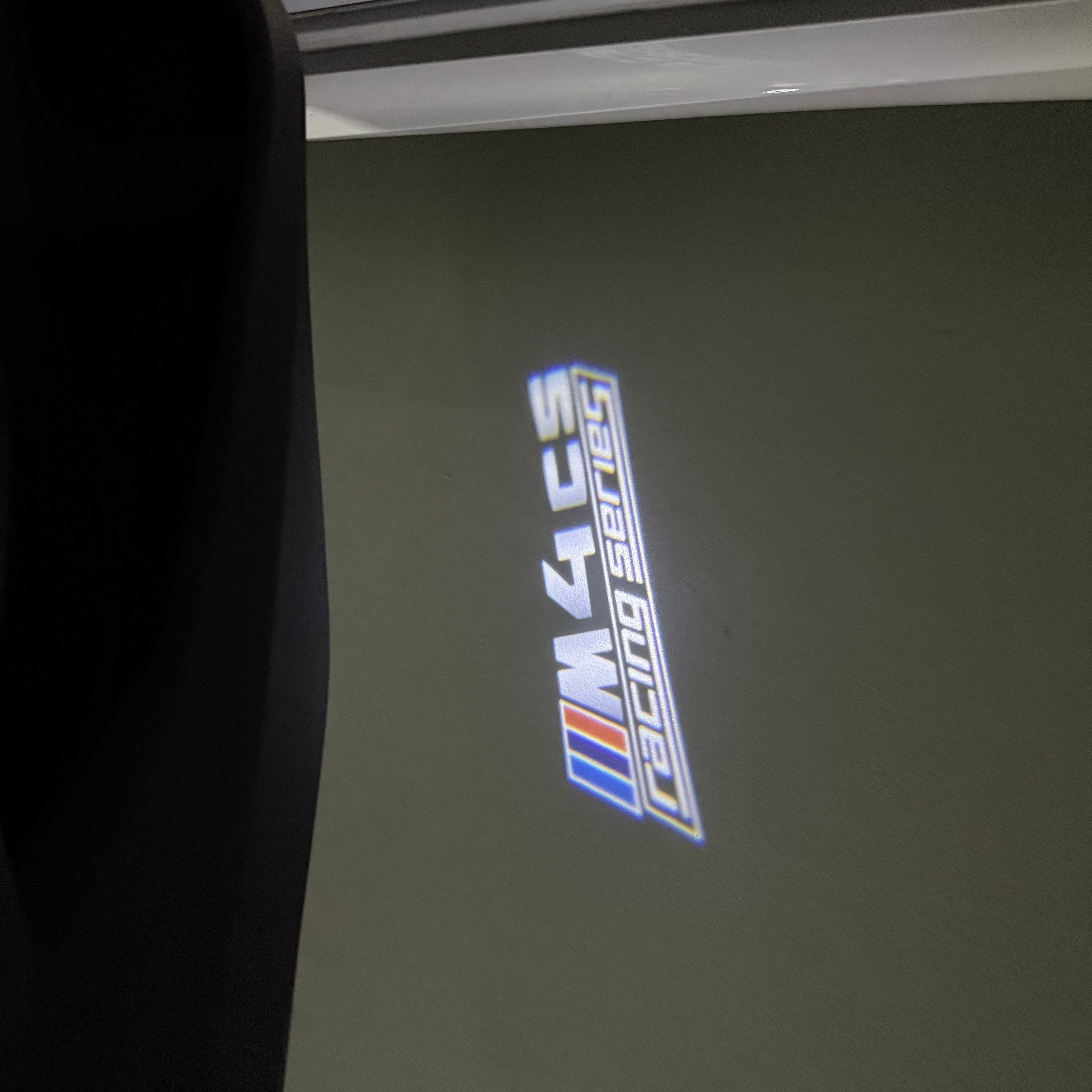 BMW 4 SERIES M4  LOGO PROJECTOT LIGHTS (quantity 1 = 1 sets/2 door lights)Nr.bmw00183