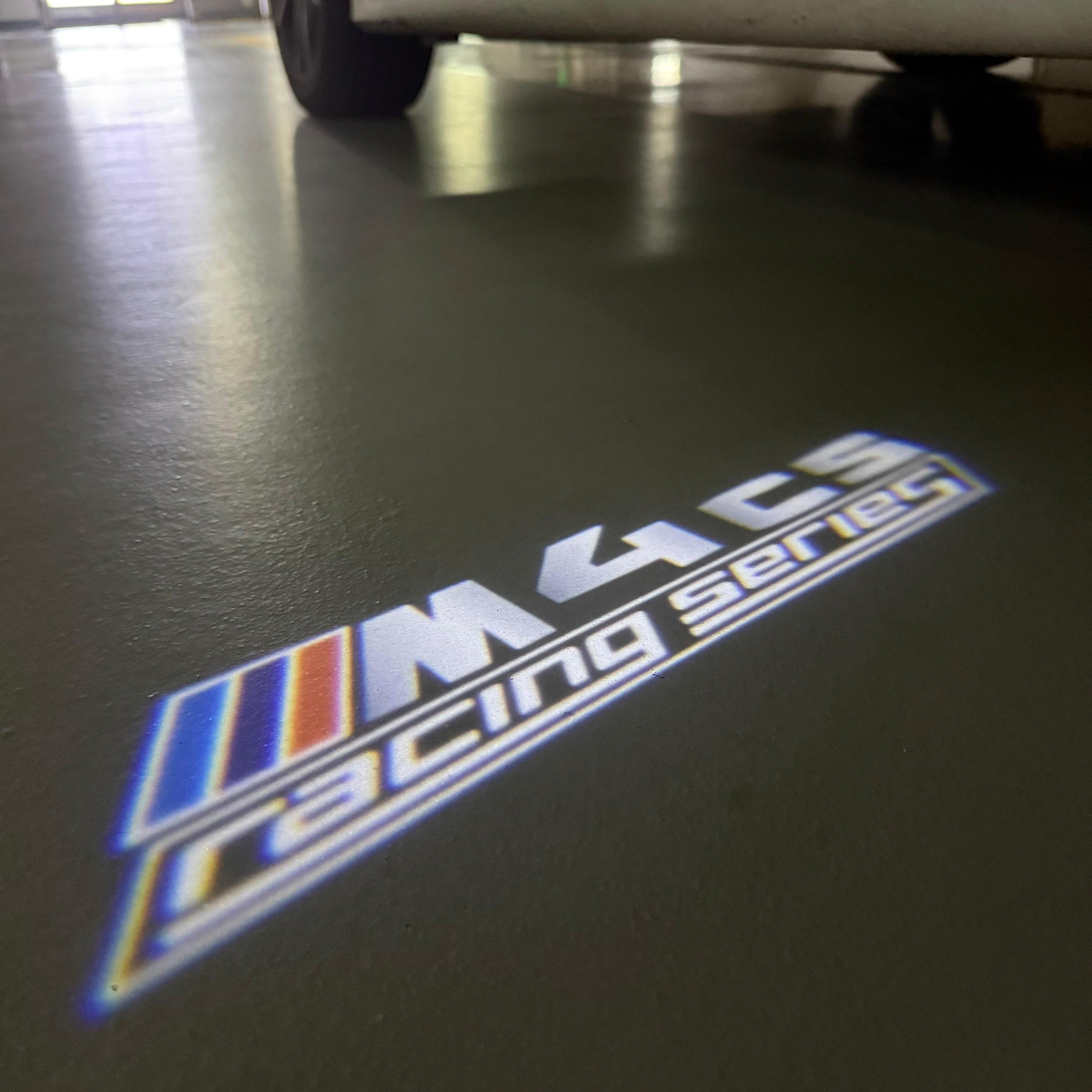 BMW 4 SERIES M4  LOGO PROJECTOT LIGHTS (quantity 1 = 1 sets/2 door lights)Nr.bmw00183