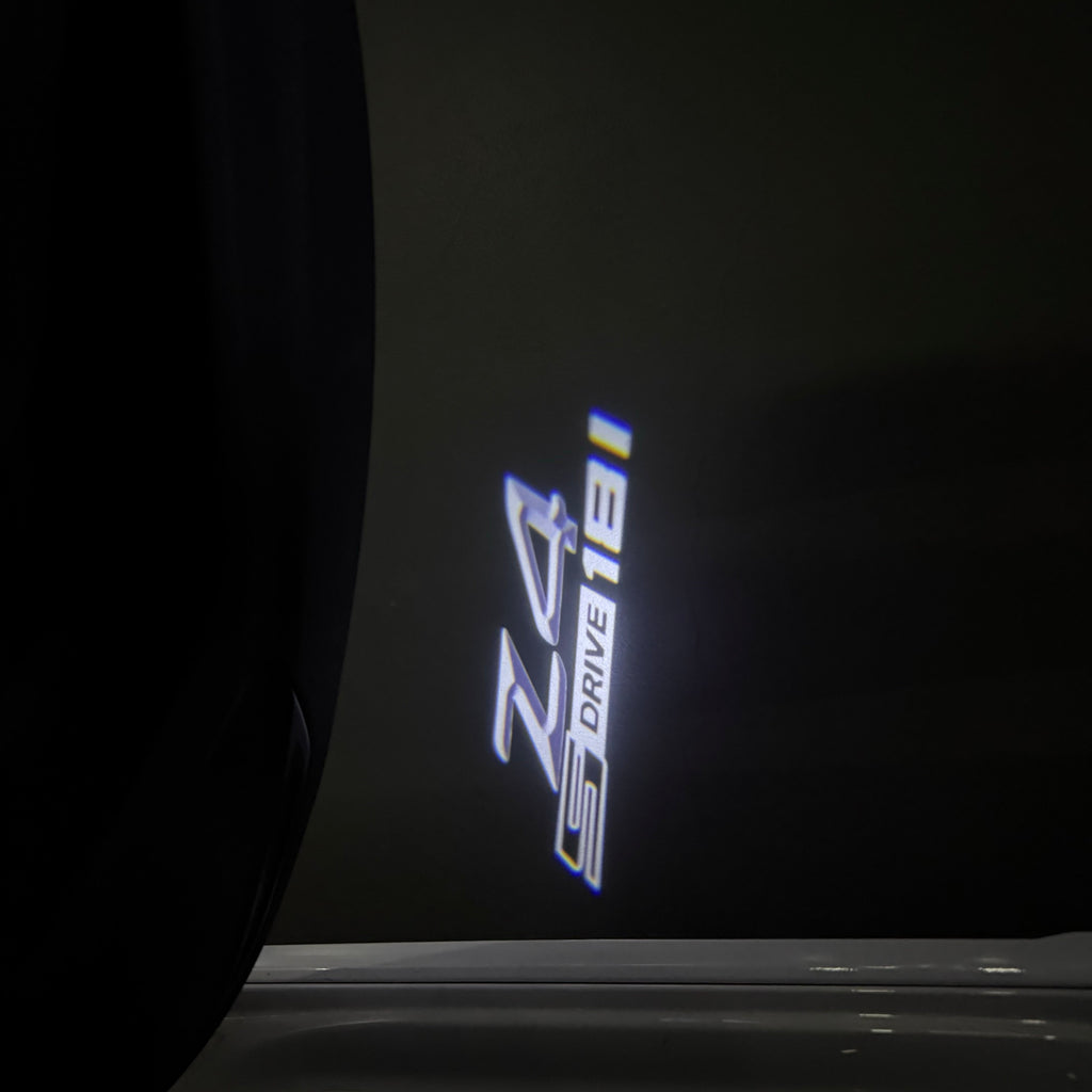BMW Z4 S drive  LOGO PROJECTOT LIGHTS (quantity 1 = 1 sets/2 door lights)Nr.bmw00154