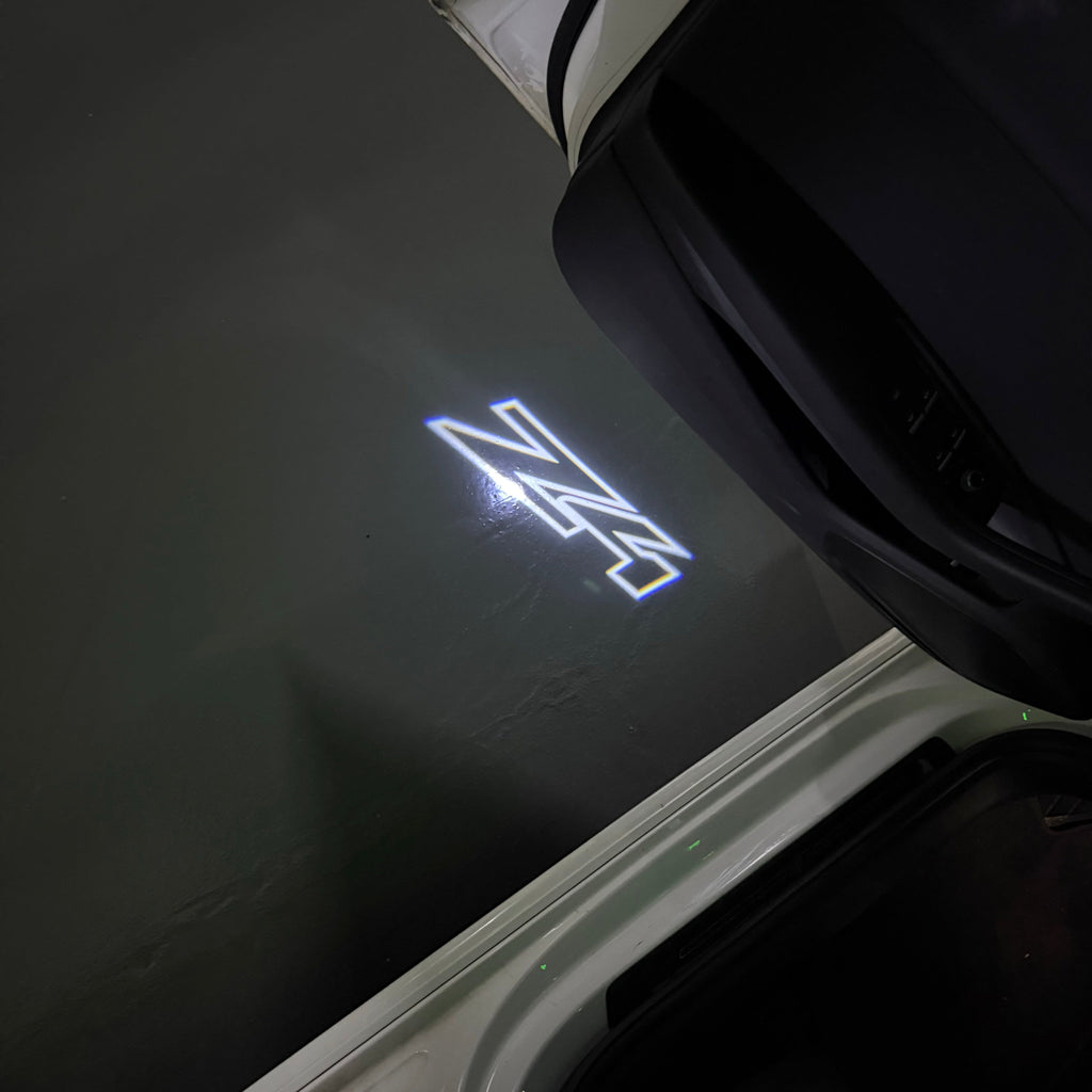 BMW  Z4  LOGO PROJECTOT LIGHTS (quantity 1 = 1 sets/2 door lights)Nr.bmw00148