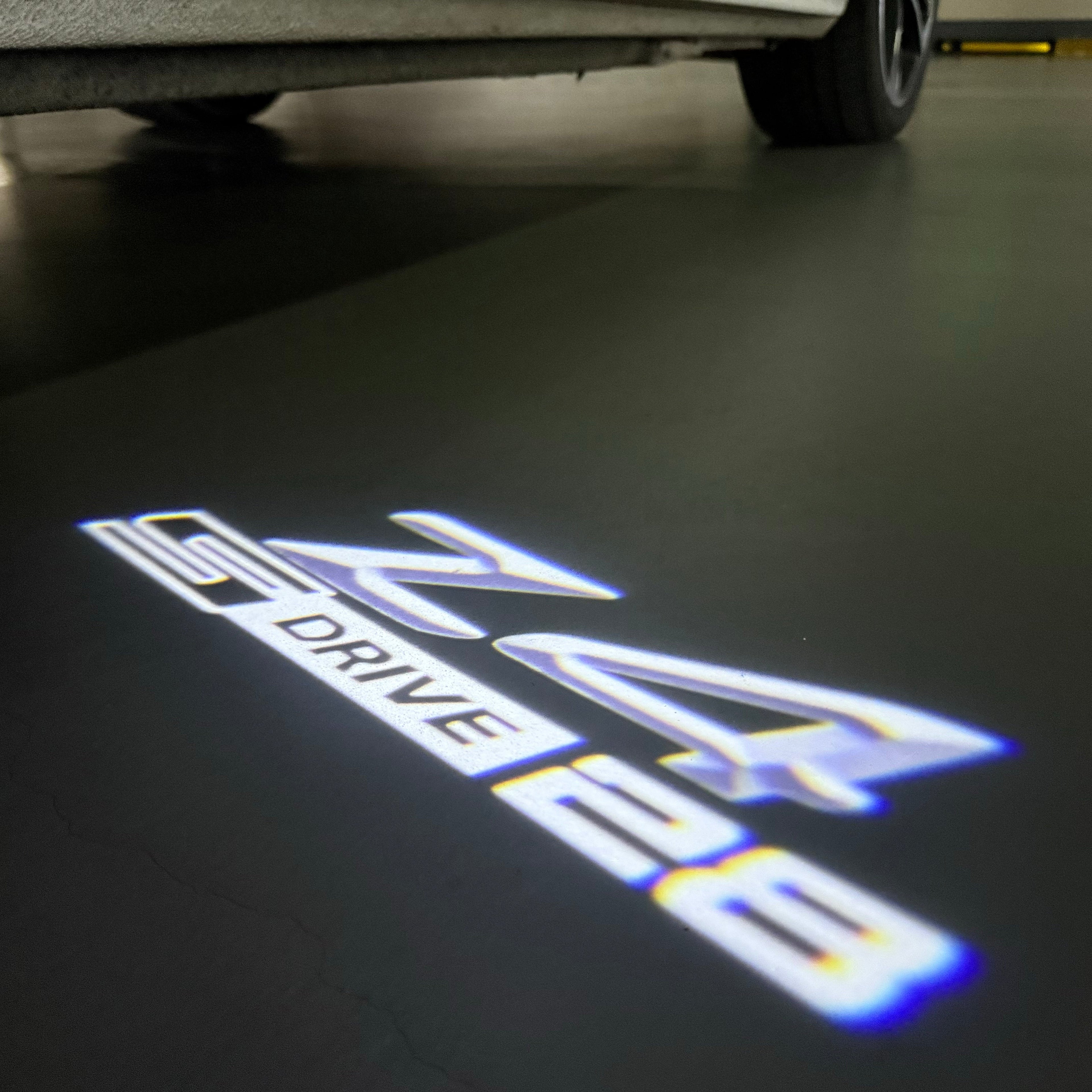 BMW  Z4 S drive  LOGO PROJECTOT LIGHTS (quantity 1 = 1 sets/2 door lights)Nr.bmw00144