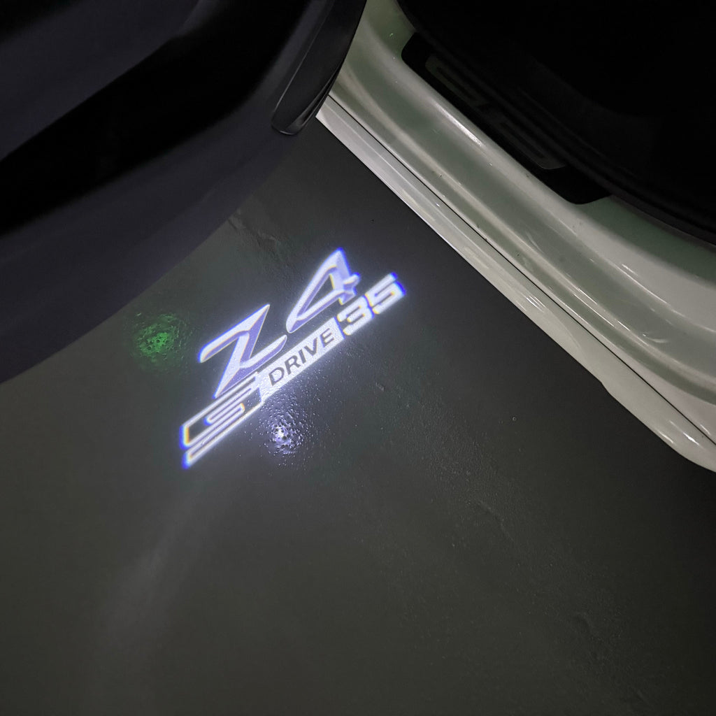 BMW  Z4 S drive  LOGO PROJECTOT LIGHTS (quantity 1 = 1 sets/2 door lights)Nr.bmw00152