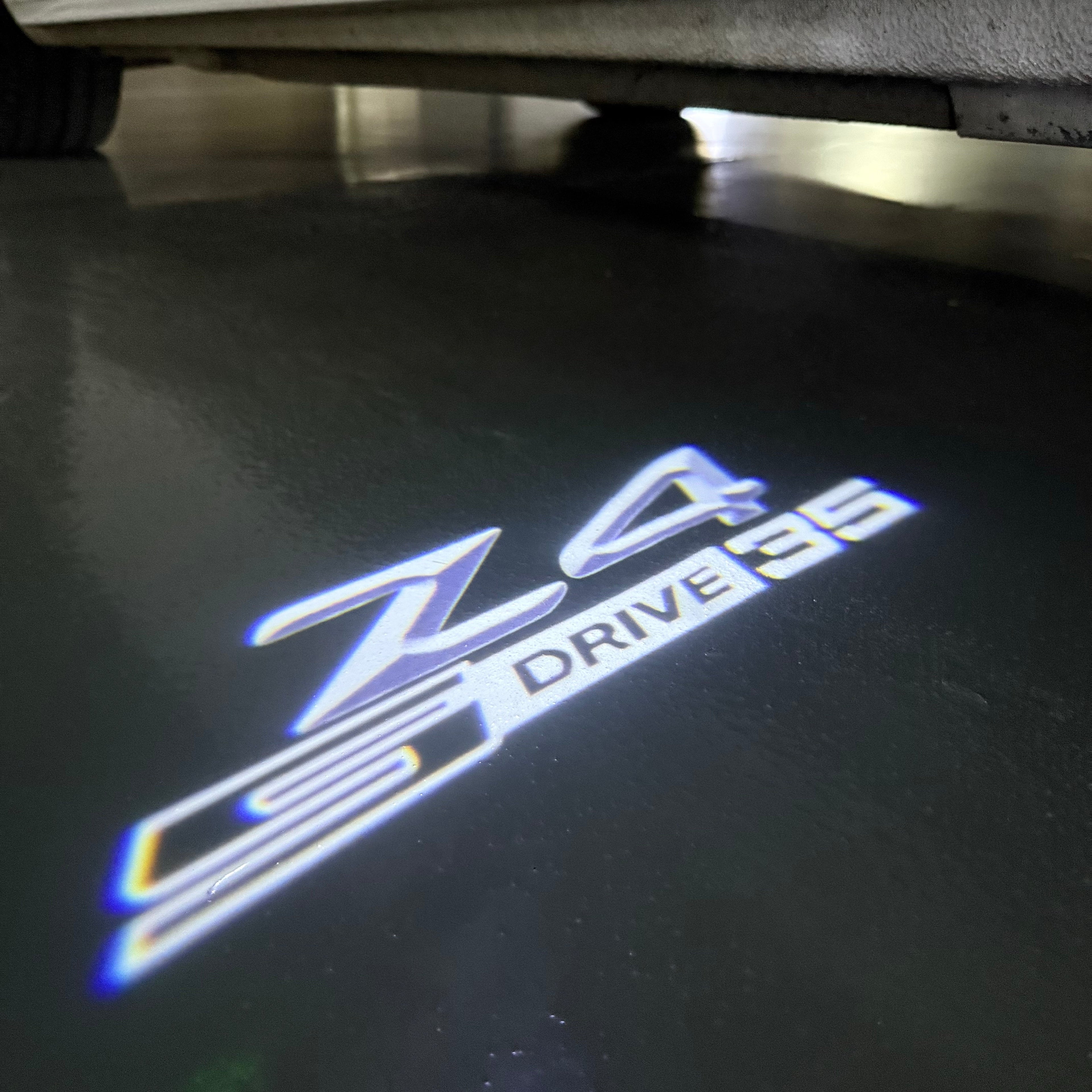 BMW  Z4 S drive  LOGO PROJECTOT LIGHTS (quantity 1 = 1 sets/2 door lights)Nr.bmw00152