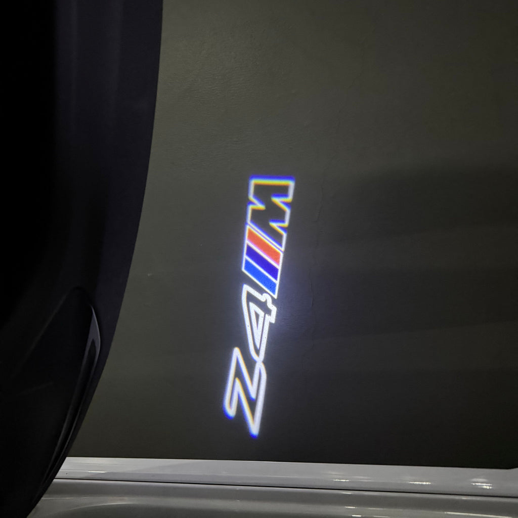 BMW Z4M  LOGO PROJECTOT LIGHTS (quantity 1 = 1 sets/2 door lights)Nr.bmw00151