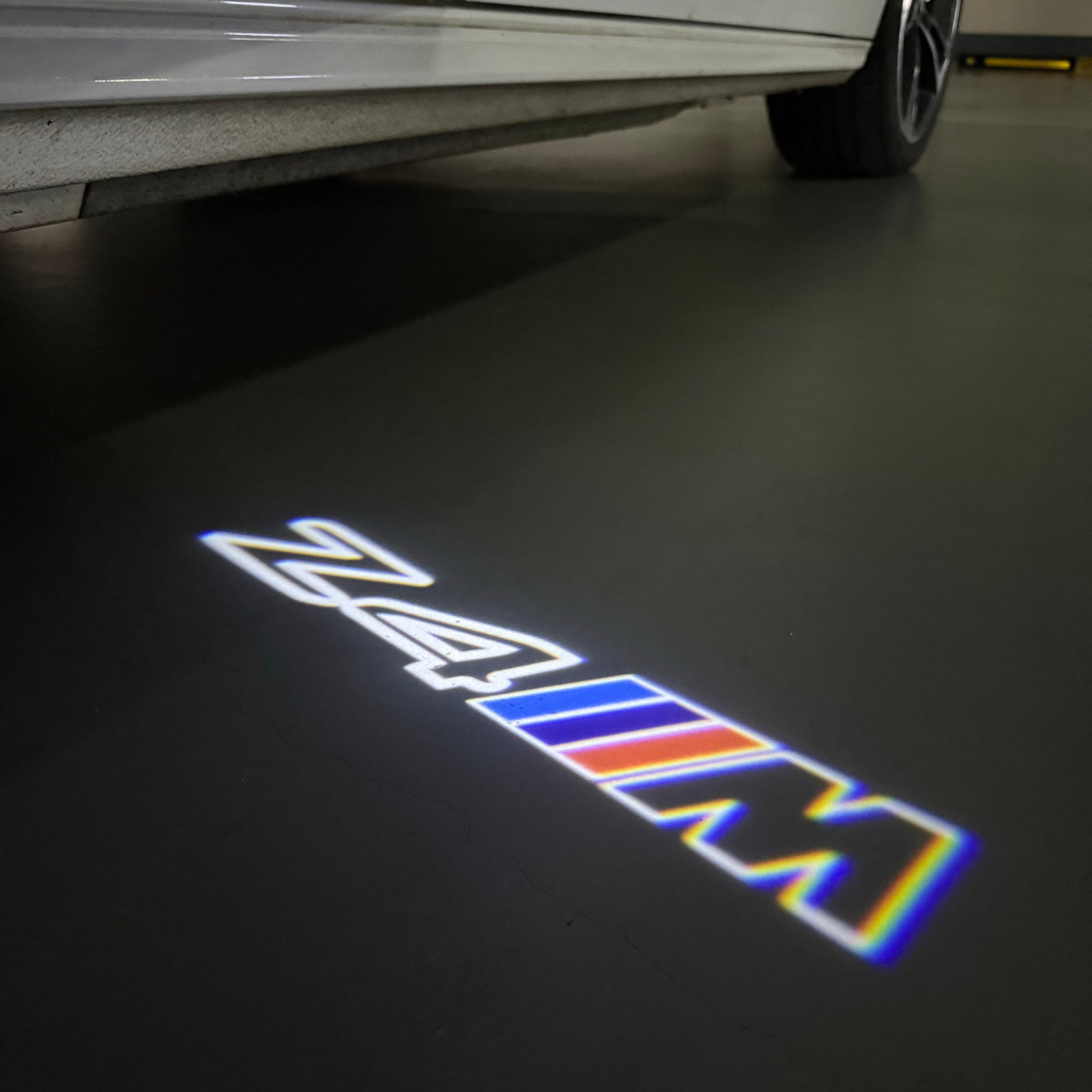 BMW Z4M  LOGO PROJECTOT LIGHTS (quantity 1 = 1 sets/2 door lights)Nr.bmw00151