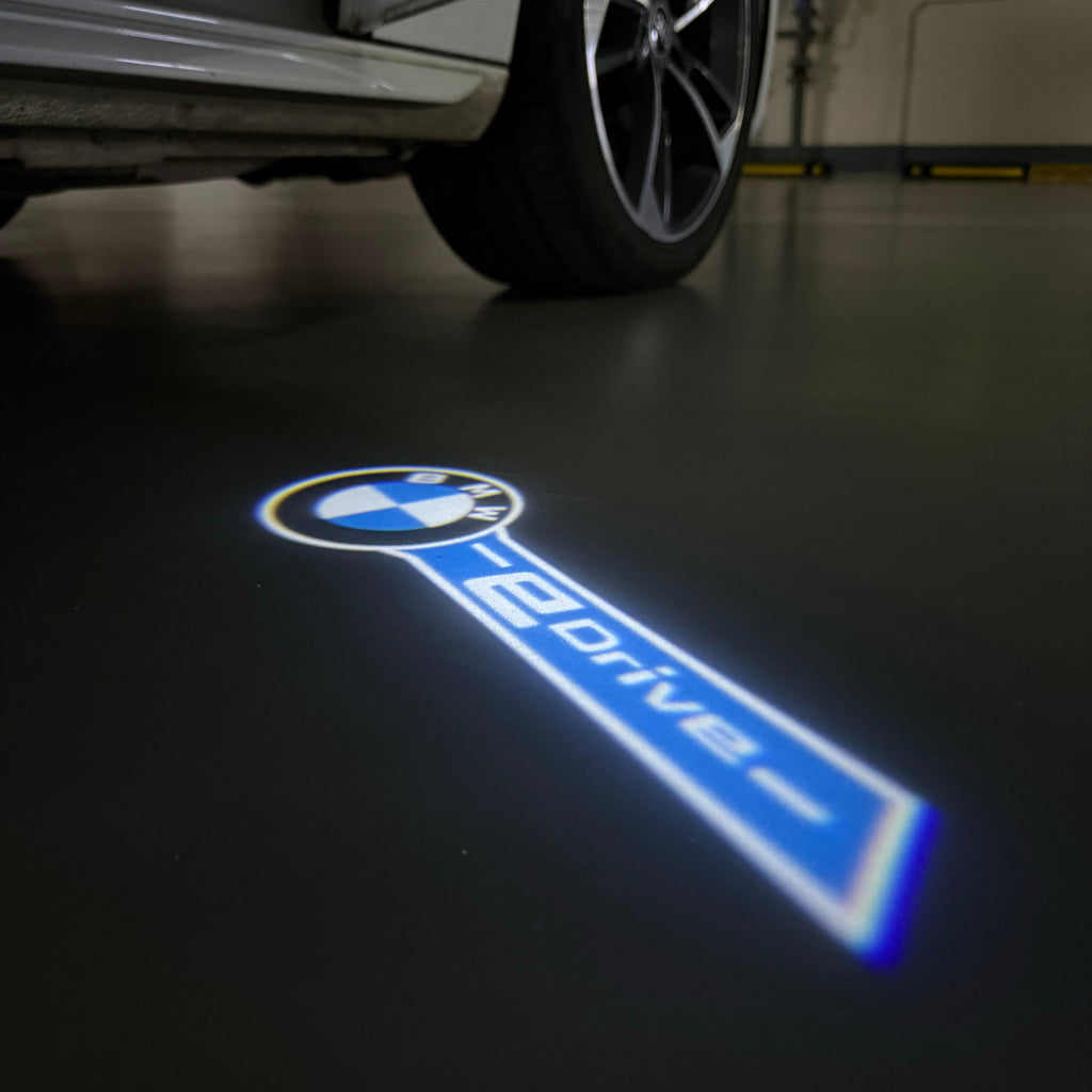 BMW E DRIVE  LOGO PROJECTOT LIGHTS (quantity 1 = 1 sets/2 door lights)Nr.bmw00315