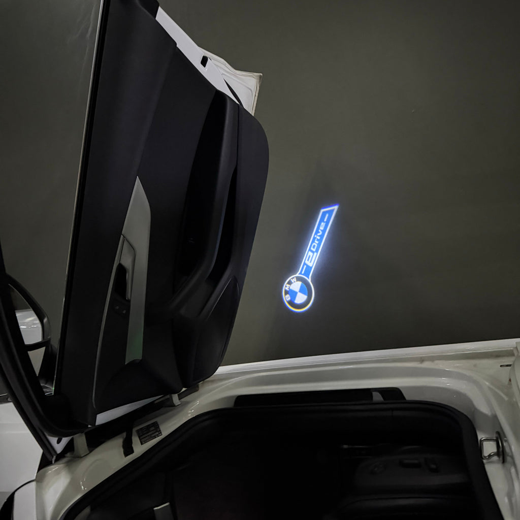 BMW E DRIVE  LOGO PROJECTOT LIGHTS (quantity 1 = 1 sets/2 door lights)Nr.bmw00315