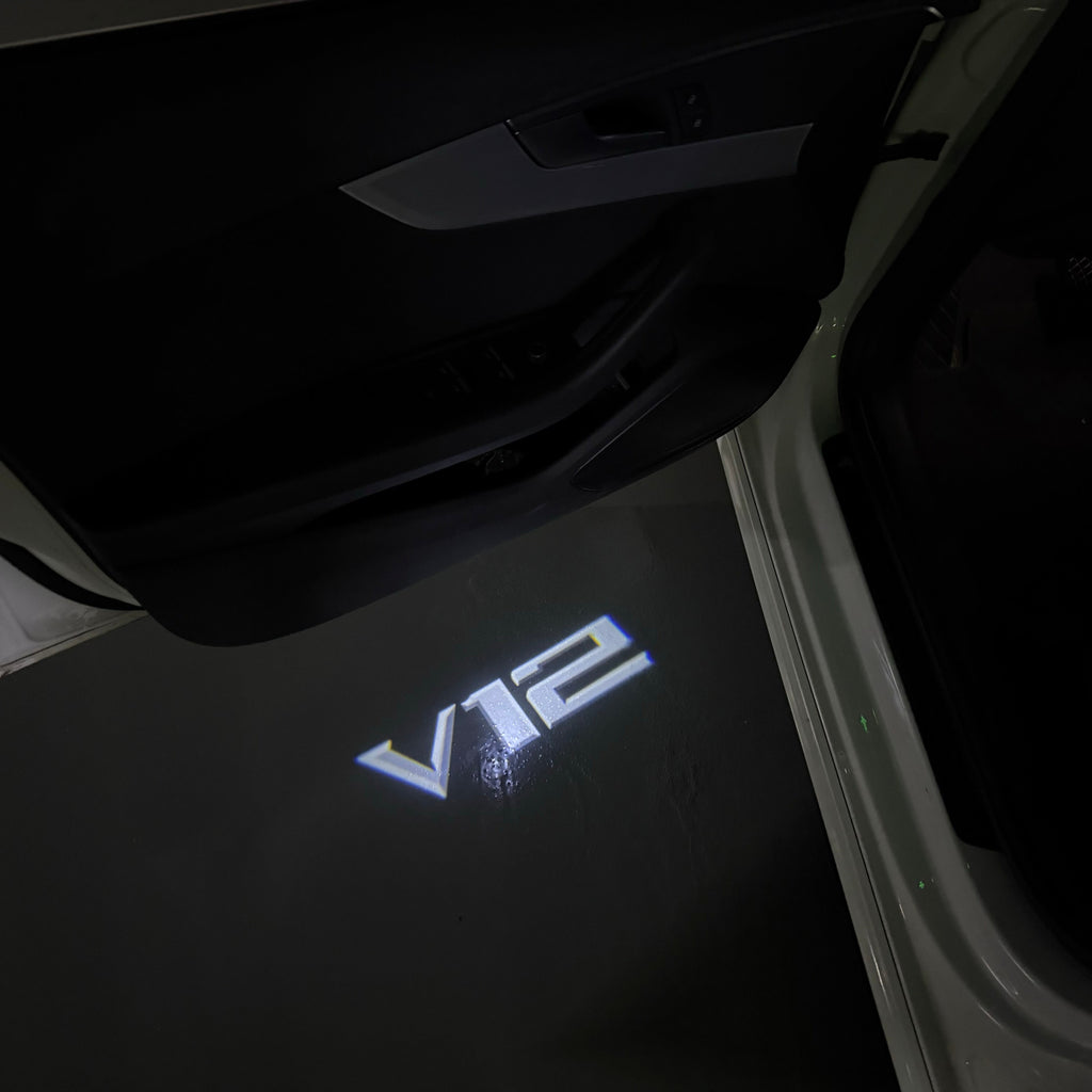 BMW 7 SERIES V12  LOGO PROJECTOT LIGHTS (quantity 1 = 1 sets/2 door lights)Nr.bmw00325