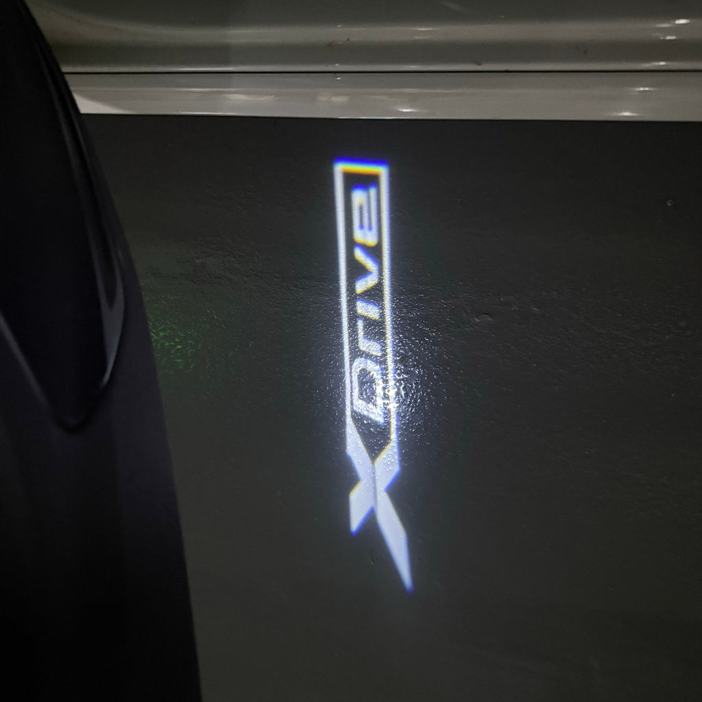 BMW X Drive  LOGO PROJECTOT LIGHTS (quantity 1 = 1 sets/2 door lights)Nr.bmw00328