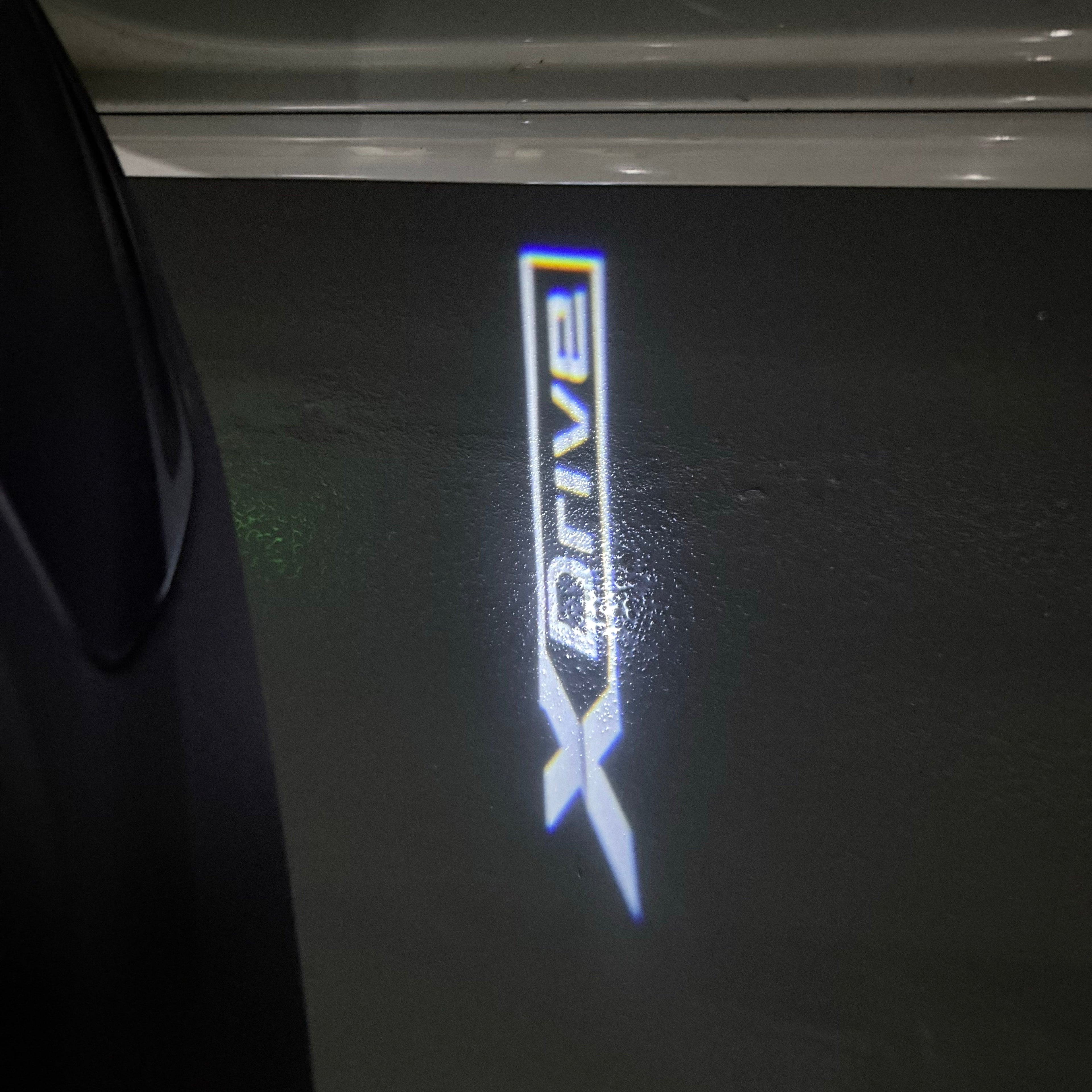 BMW X Drive  LOGO PROJECTOT LIGHTS (quantity 1 = 1 sets/2 door lights)Nr.bmw00328