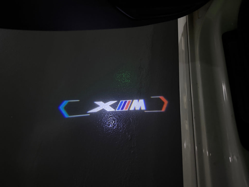 BMW XM    LOGO PROJECTOT LIGHTS (quantity 1 = 1 sets/2 door lights)Nr.bmw00160