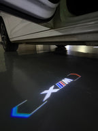 BMW XM    LOGO PROJECTOT LIGHTS (quantity 1 = 1 sets/2 door lights)Nr.bmw00160
