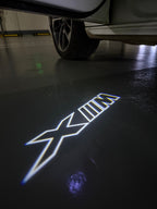 BMW XM    LOGO PROJECTOT LIGHTS (quantity 1 = 1 sets/2 door lights)Nr.bmw00159