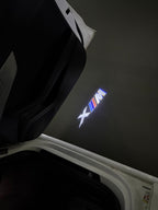 BMW XM    LOGO PROJECTOT LIGHTS (quantity 1 = 1 sets/2 door lights)Nr.bmw00161