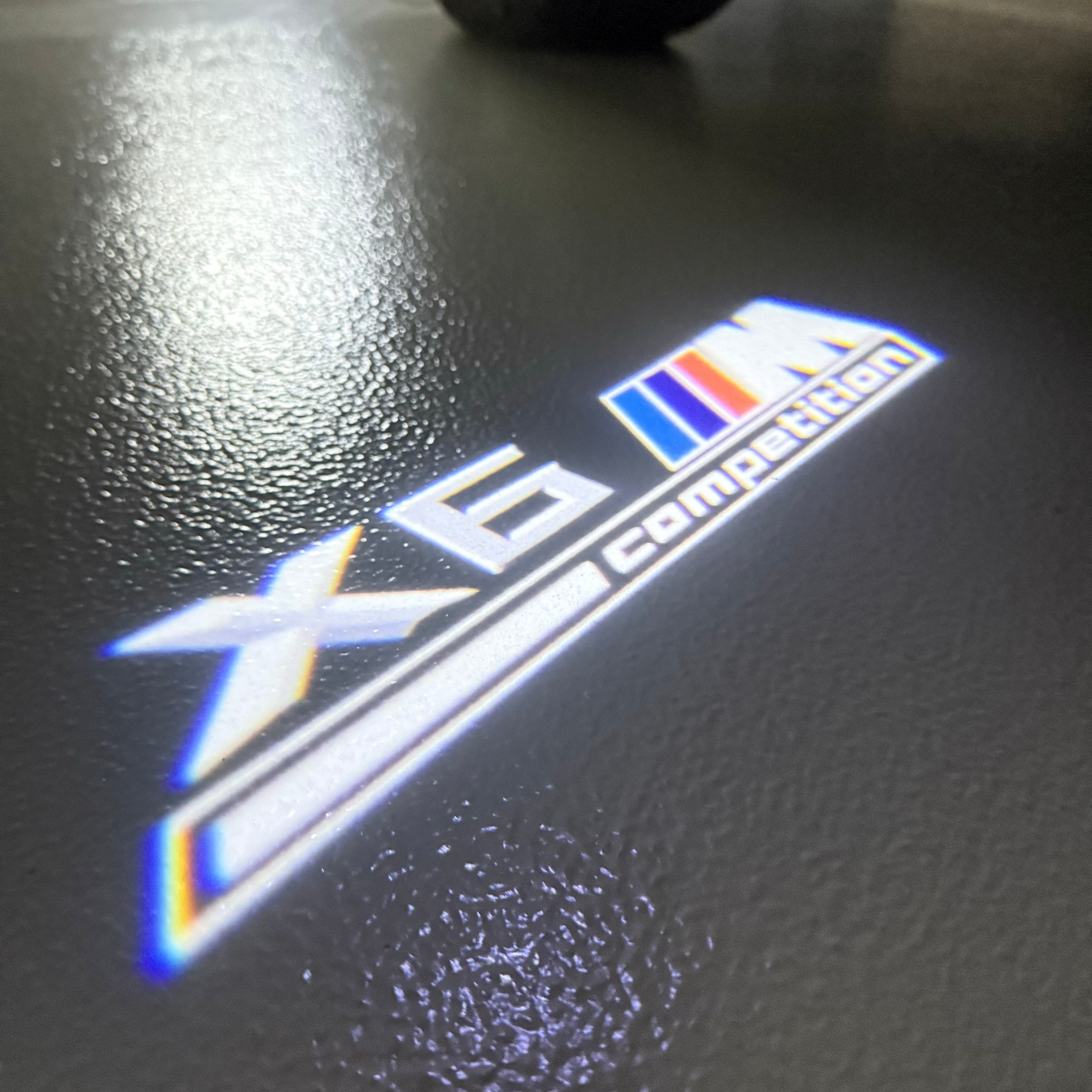 BMW   X6M LOGO PROJECTOT LIGHTS (quantity 1 = 1 sets/2 door lights)Nr.bmw0025