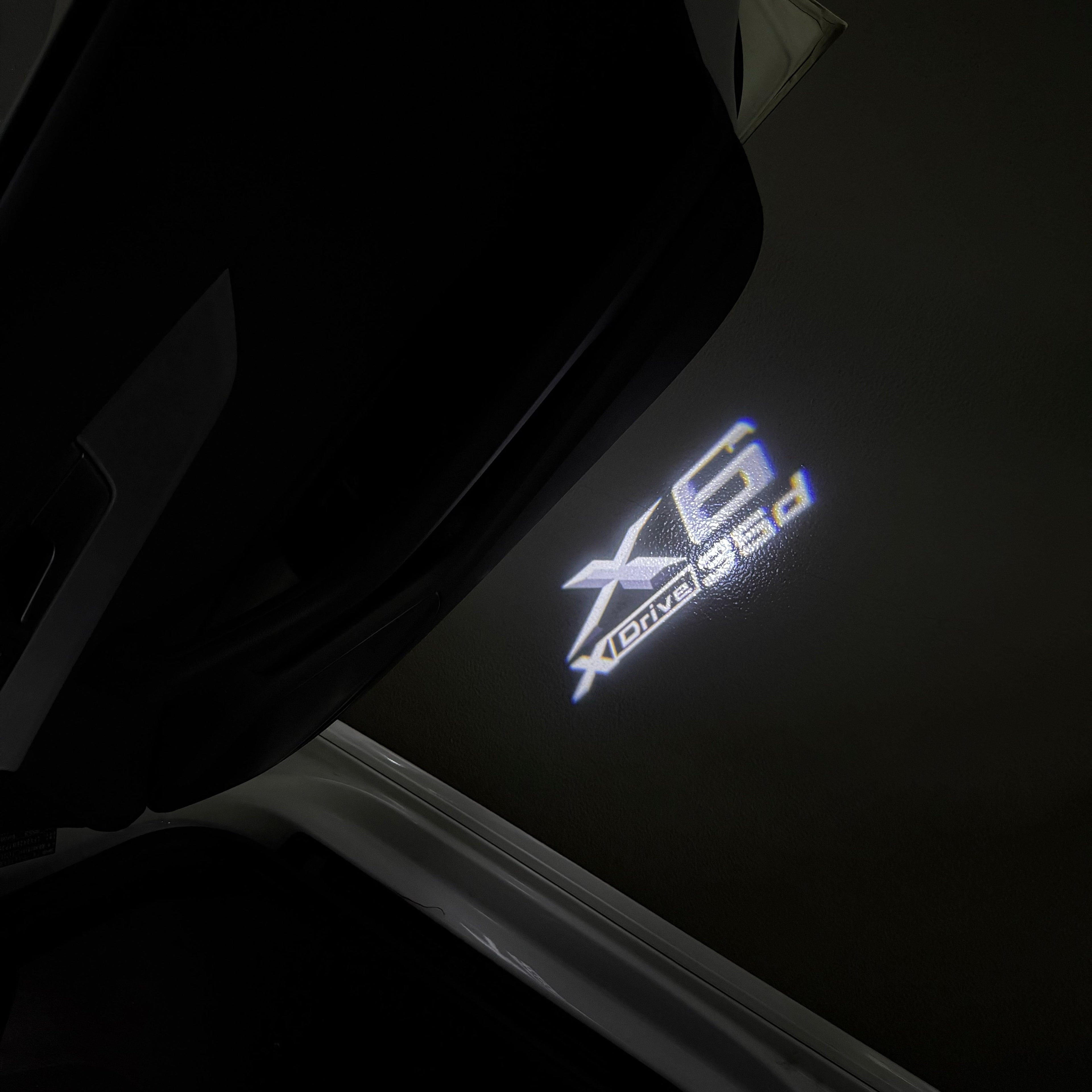 BMW  X6 Xdrive LOGO PROJECTOT LIGHTS (quantity 1 = 1 sets/2 door lights)Nr.bmw0079
