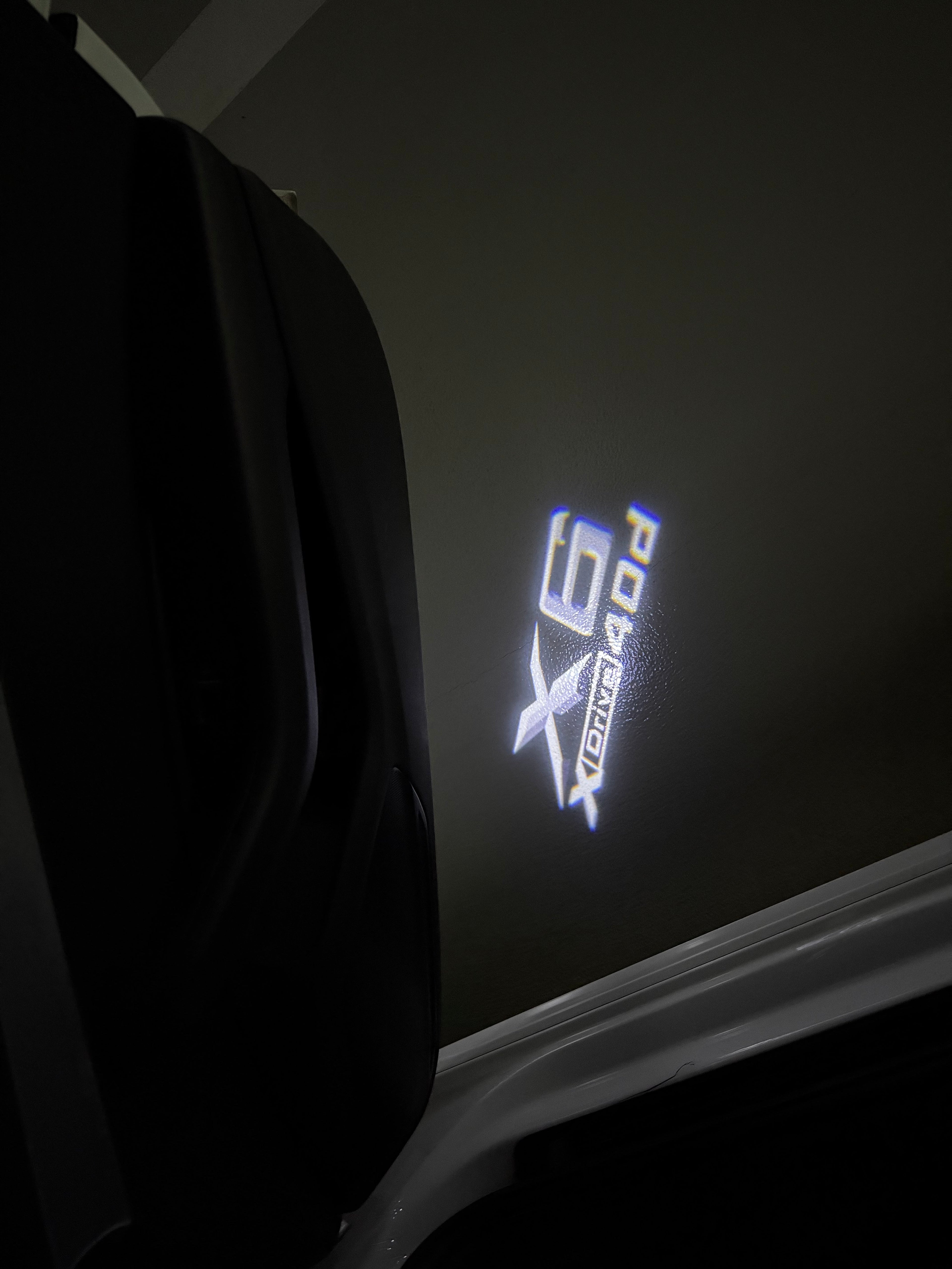 BMW X6 Xdrive  LOGO PROJECTOT LIGHTS (quantity 1 = 1 sets/2 door lights)Nr.bmw0083